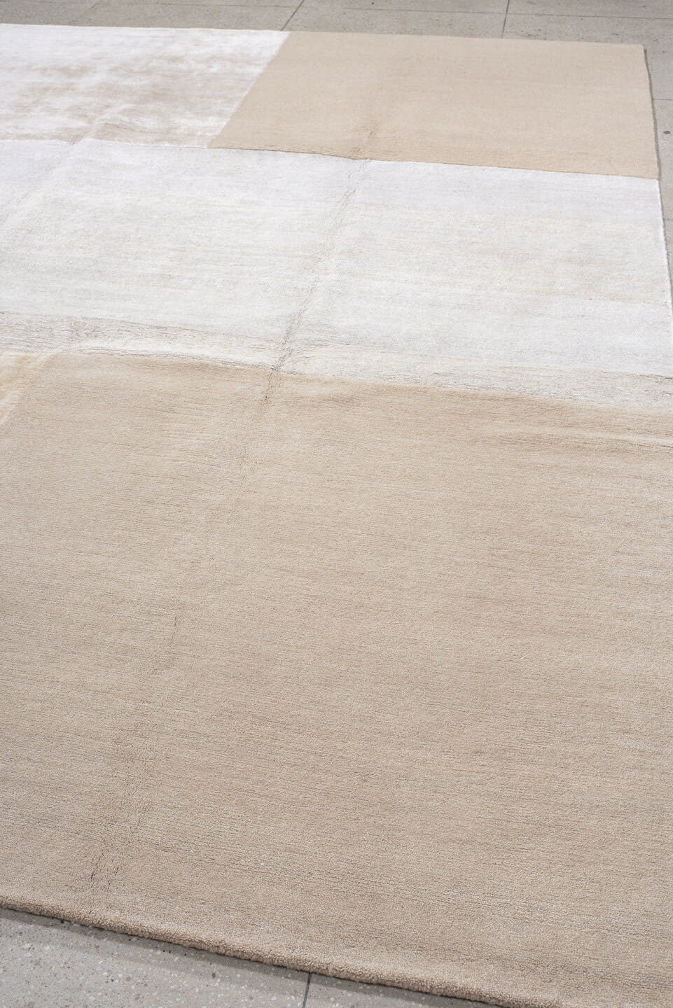 9' x 12' one-of-a-kind handmade handmade Modern large size rug. Color palette: ivory, beige, taupe, cream, camel, gray