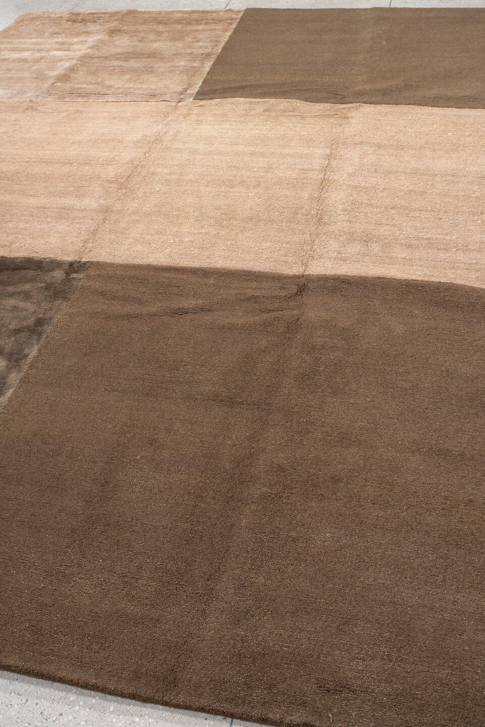 9' x 12' one-of-a-kind handmade handmade Modern large size rug. Color palette: taupe, camel, beige, brown, mushroom, gray