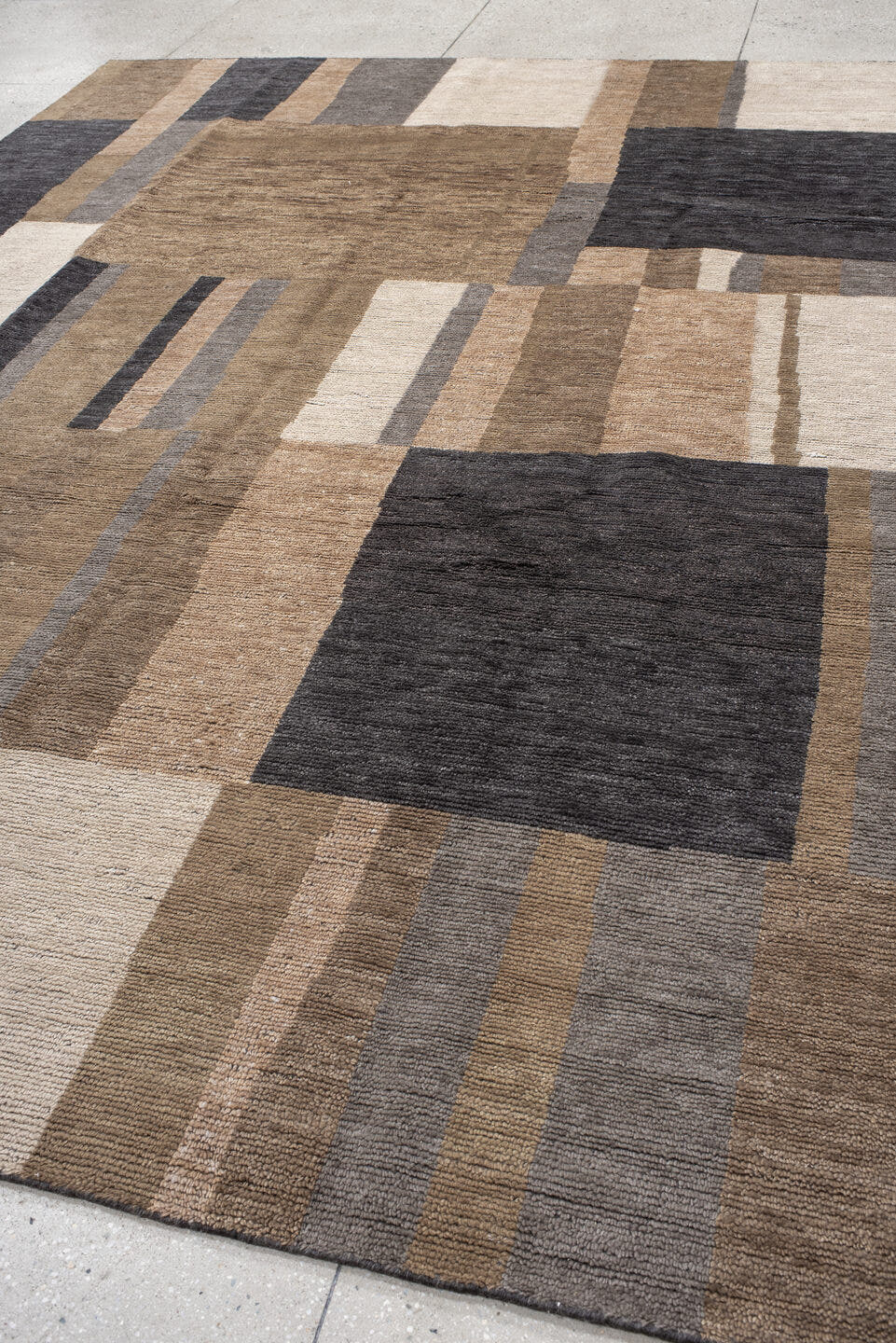 9' x 12' one-of-a-kind handmade handmade Modern large size rug. Color palette: taupe, charcoal, ivory, camel, greige, beige