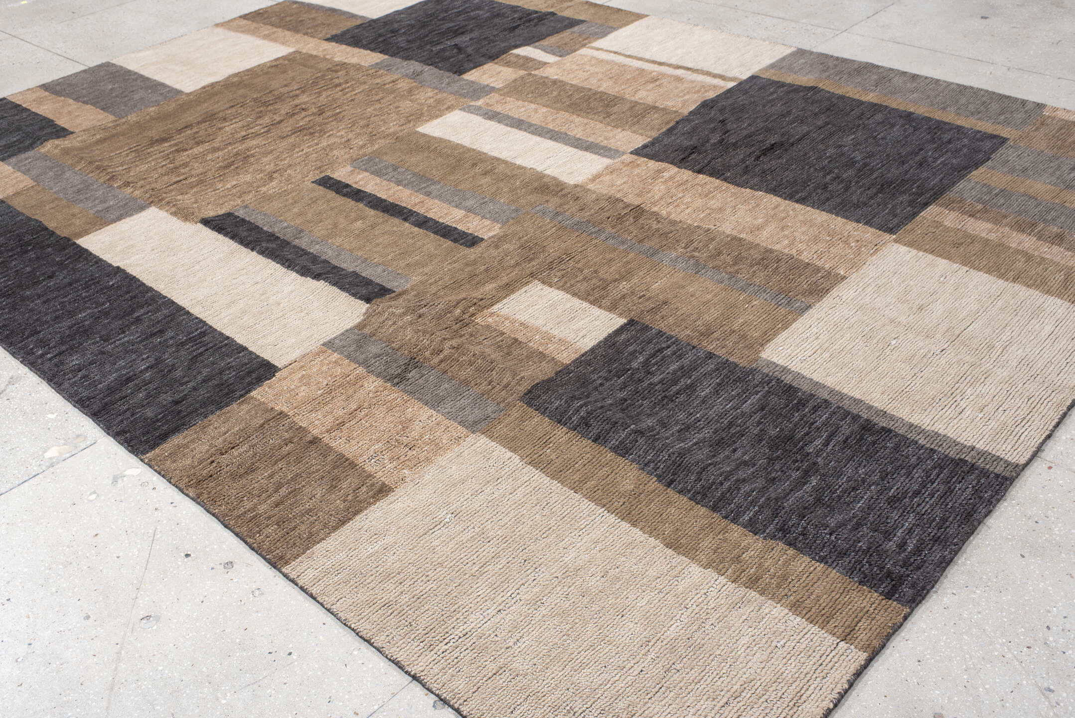 9' x 12' one-of-a-kind handmade handmade Modern large size rug. Color palette: taupe, charcoal, ivory, camel, greige, beige