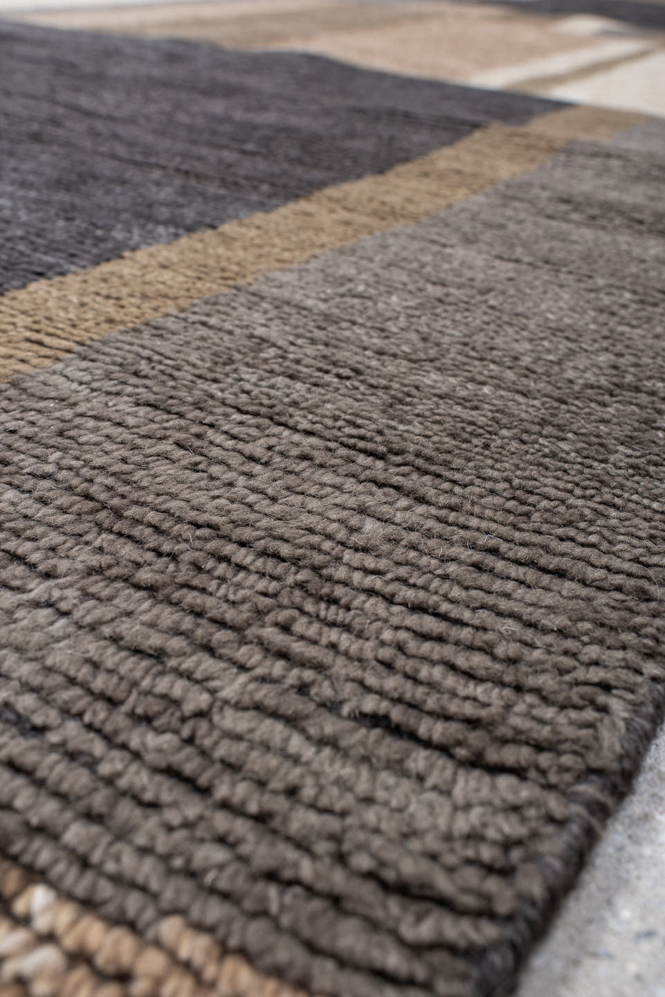 9' x 12' one-of-a-kind handmade handmade Modern large size rug. Color palette: taupe, charcoal, ivory, camel, greige, beige