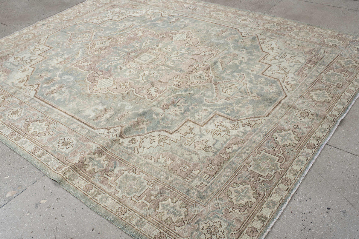 7' x 9' one-of-a-kind handmade vintage Heriz large size rug. Color palette: ivory, pale blue, taupe, beige, blush, sage