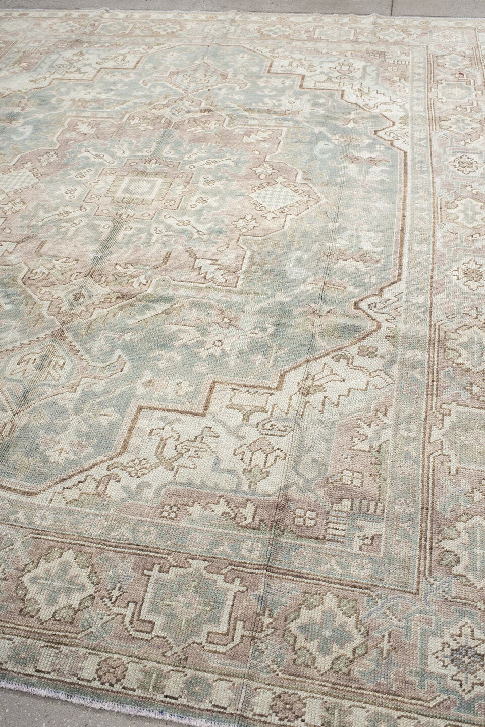 7' x 9' one-of-a-kind handmade vintage Heriz large size rug. Color palette: ivory, pale blue, taupe, beige, blush, sage