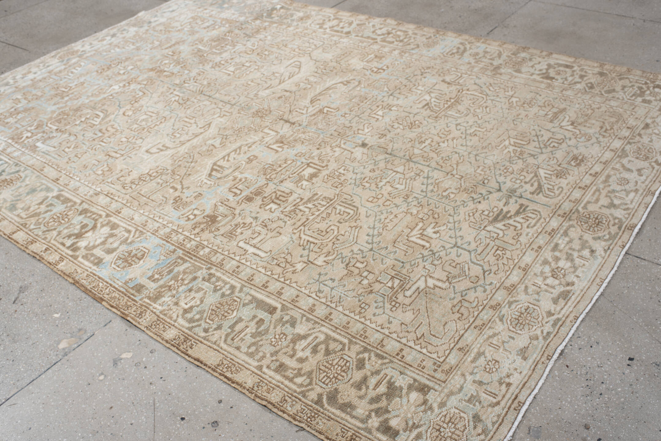 7' x 10' one-of-a-kind handmade vintage Heriz large size rug. Color palette: ivory, taupe, light blue, beige, camel, gray