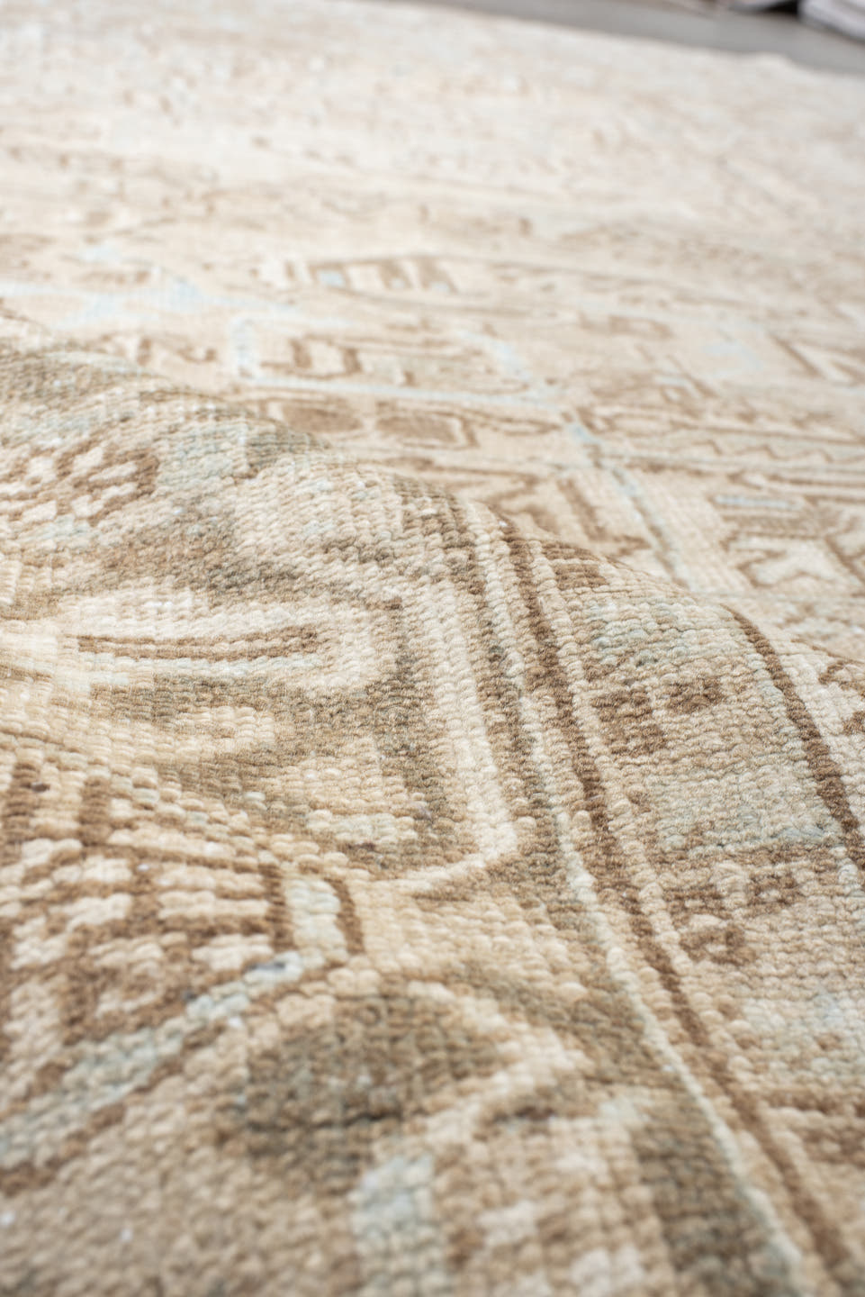 7' x 10' one-of-a-kind handmade vintage Heriz large size rug. Color palette: ivory, taupe, light blue, beige, camel, gray