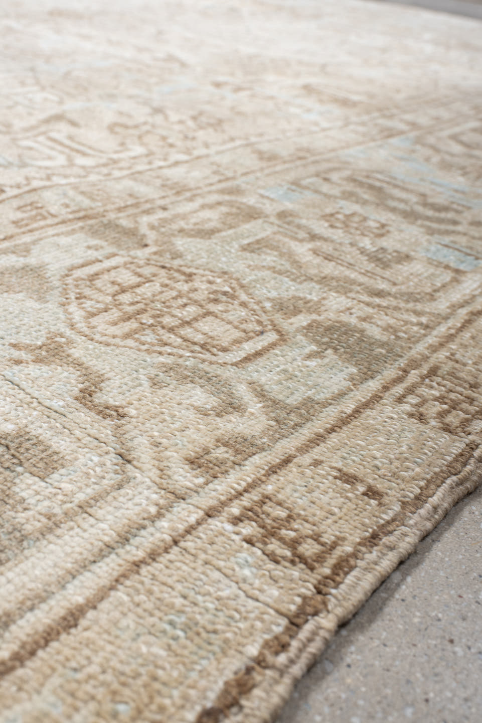 7' x 10' one-of-a-kind handmade vintage Heriz large size rug. Color palette: ivory, taupe, light blue, beige, camel, gray