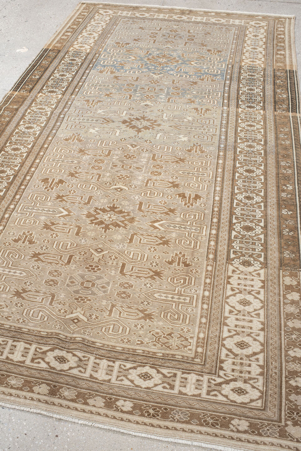 4' x 7' one-of-a-kind handmade vintage Perpedil rug. Color palette: taupe, ivory, beige, camel, slate, brown, gray