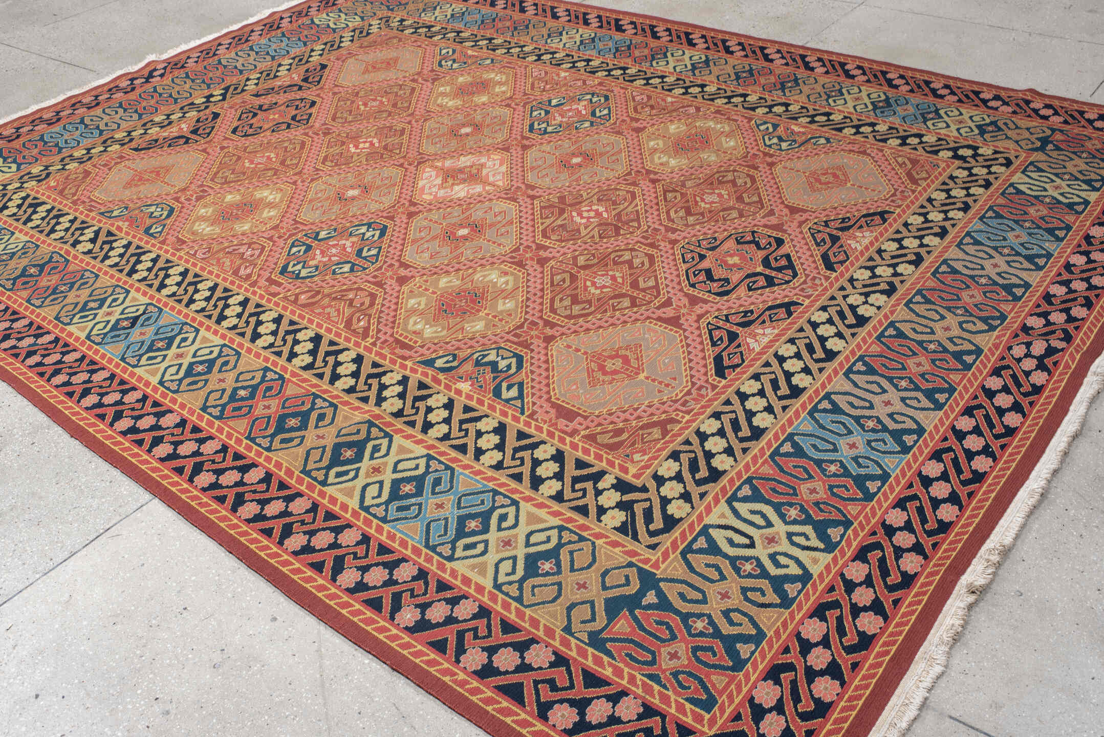 8' x 11' one-of-a-kind handmade vintage Sumak large size rug. Color palette: terra cotta, navy, ivory, sky blue, rust, rose