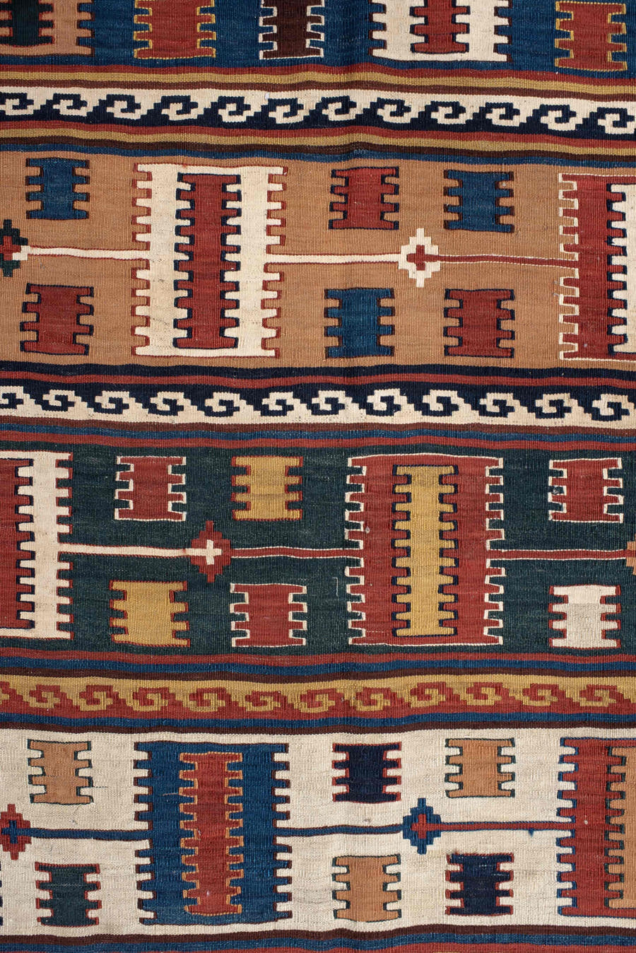 5' x 9' one-of-a-kind handmade vintage Kilim medium size rug. Color palette: rust, ivory, indigo, camel, teal, brown, navy
