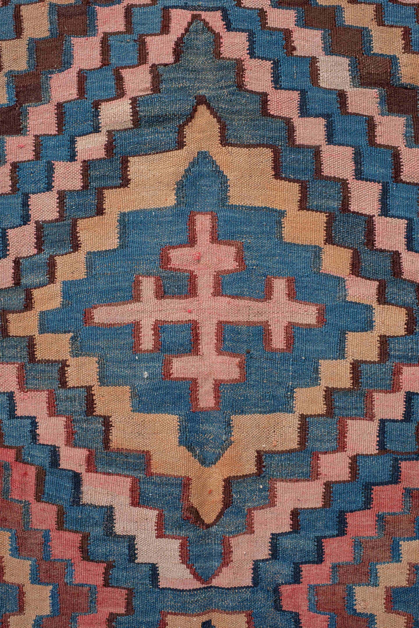 5' x 14' one-of-a-kind handmade vintage Kilim runner rug. Color palette: rose, indigo, ivory, rust, teal, camel, charcoal