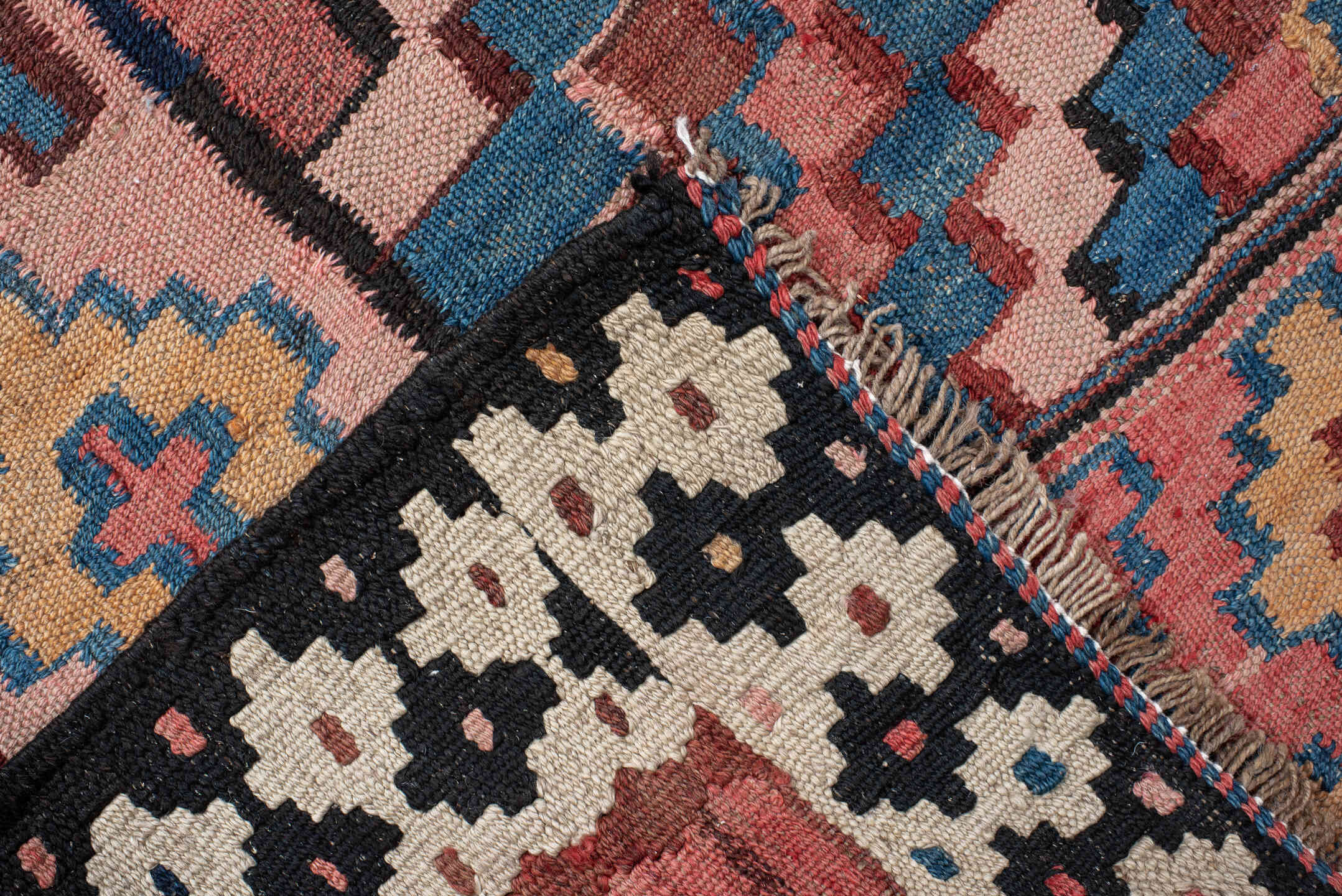 5' x 14' one-of-a-kind handmade vintage Kilim runner rug. Color palette: rose, indigo, ivory, rust, teal, camel, charcoal