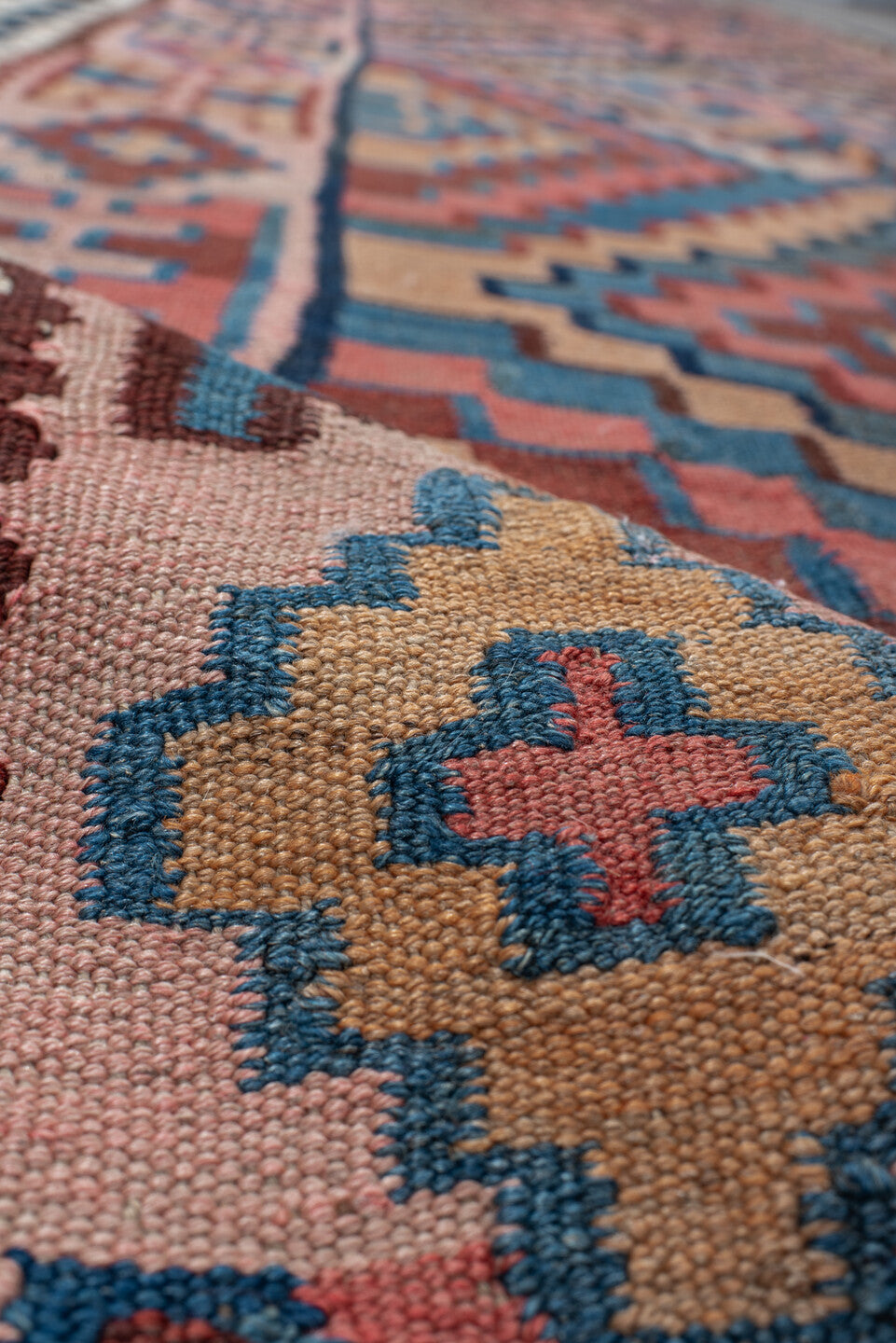 5' x 14' one-of-a-kind handmade vintage Kilim runner rug. Color palette: rose, indigo, ivory, rust, teal, camel, charcoal