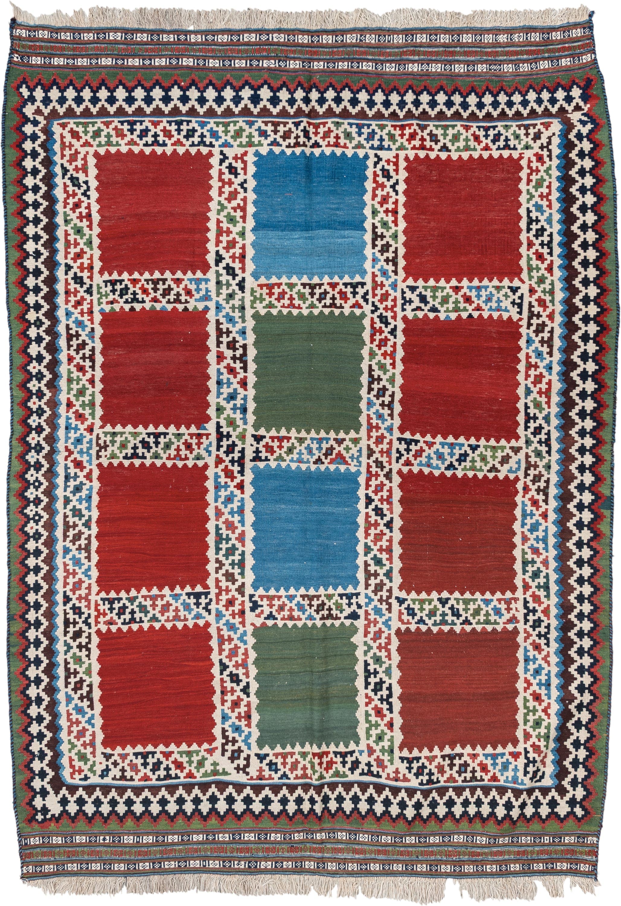 5' x 7' one-of-a-kind handmade vintage Kilim rug. Color palette: rust, ivory, navy, sky_blue, olive, red, teal, brown