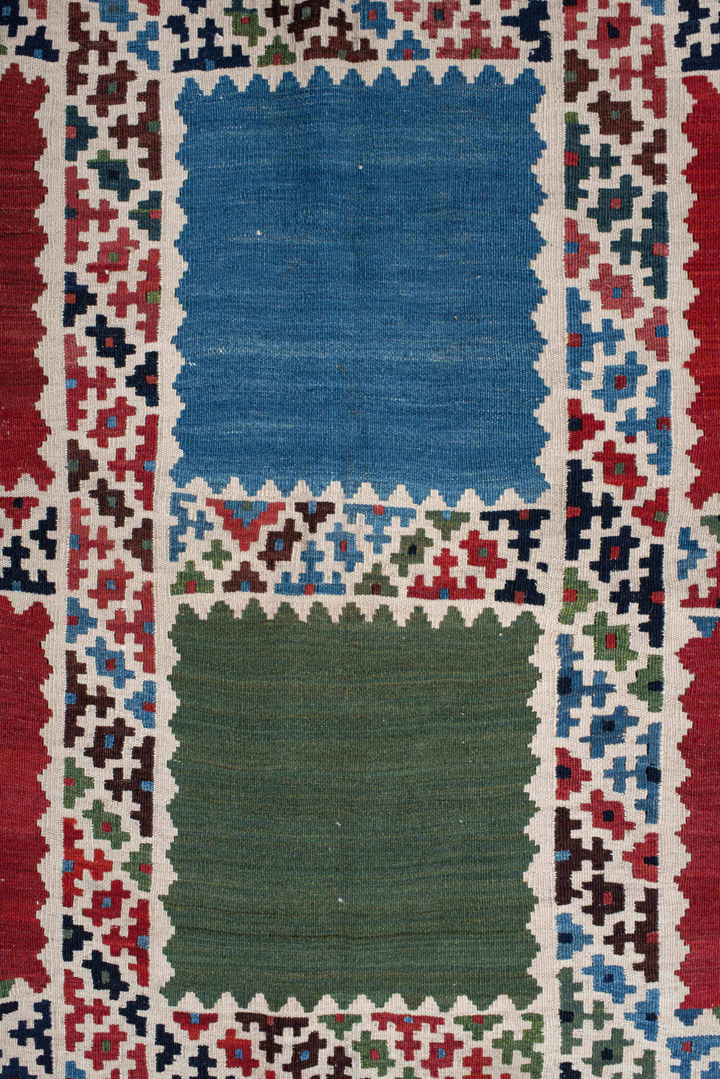 5' x 7' one-of-a-kind handmade vintage Kilim rug. Color palette: rust, ivory, navy, sky_blue, olive, red, teal, brown