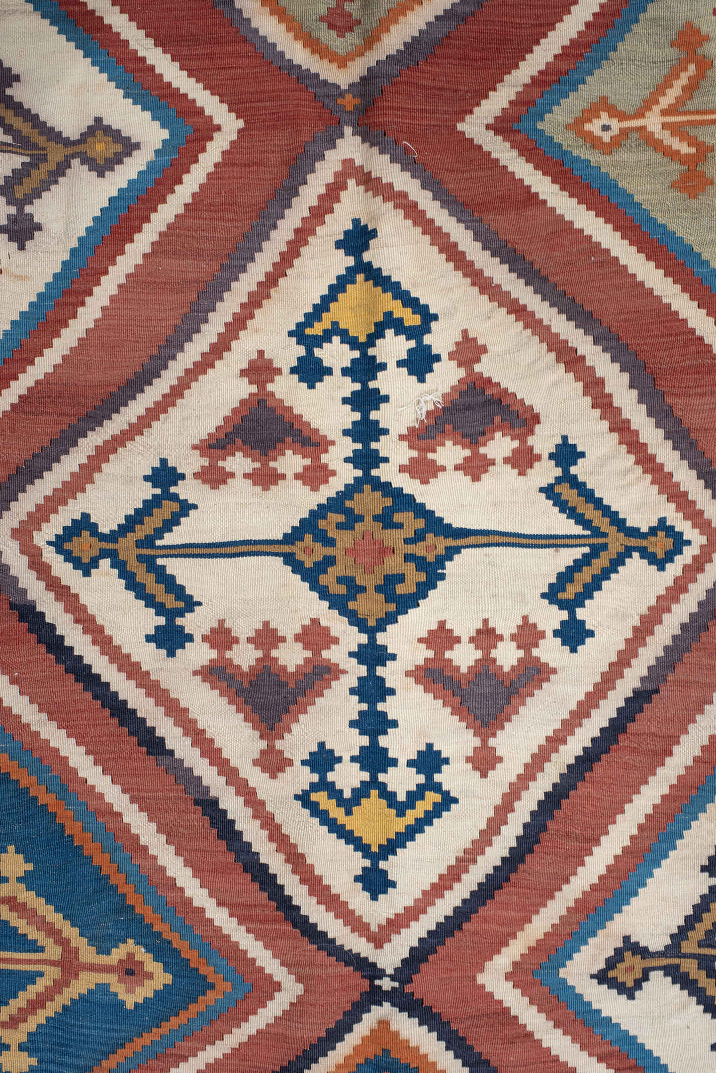 5' x 9' one-of-a-kind handmade vintage Kilim medium size rug. Color palette: terra cotta, ivory, teal, rust, brown, navy