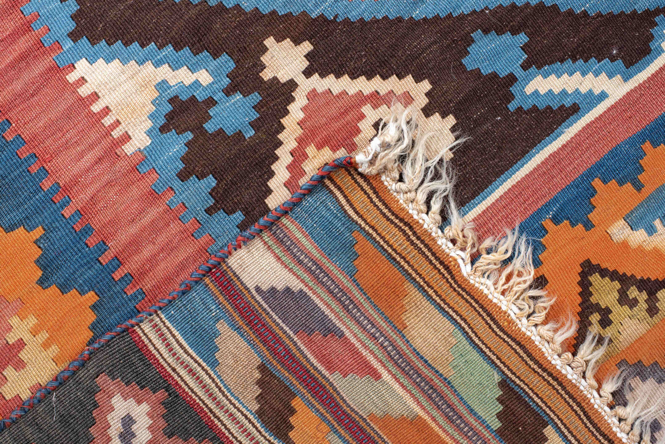 5' x 9' one-of-a-kind handmade vintage Kilim medium size rug. Color palette: terra cotta, ivory, teal, rust, brown, navy