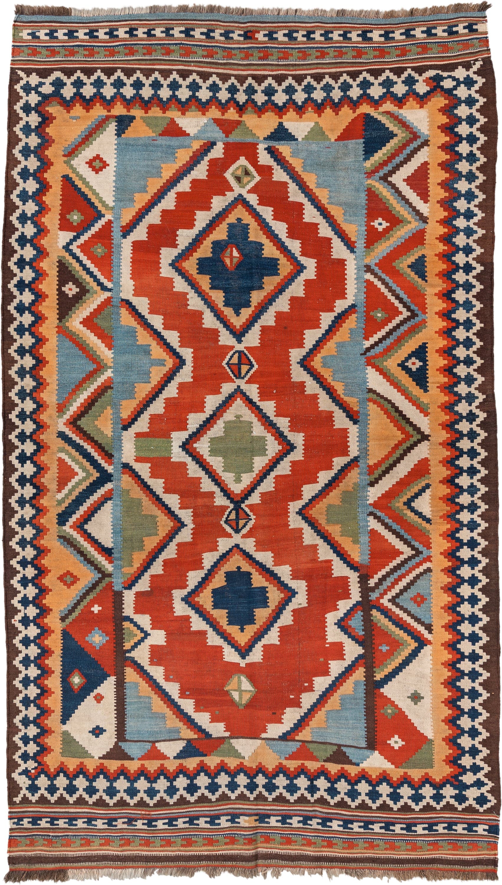 4' x 8' one-of-a-kind handmade vintage Kilim rug. Color palette: rust, ivory, sky_blue, navy, brown, camel, olive, coral