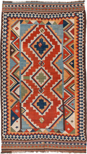 4' x 8' one-of-a-kind handmade vintage Kilim rug. Color palette: rust, ivory, sky_blue, navy, brown, camel, olive, coral