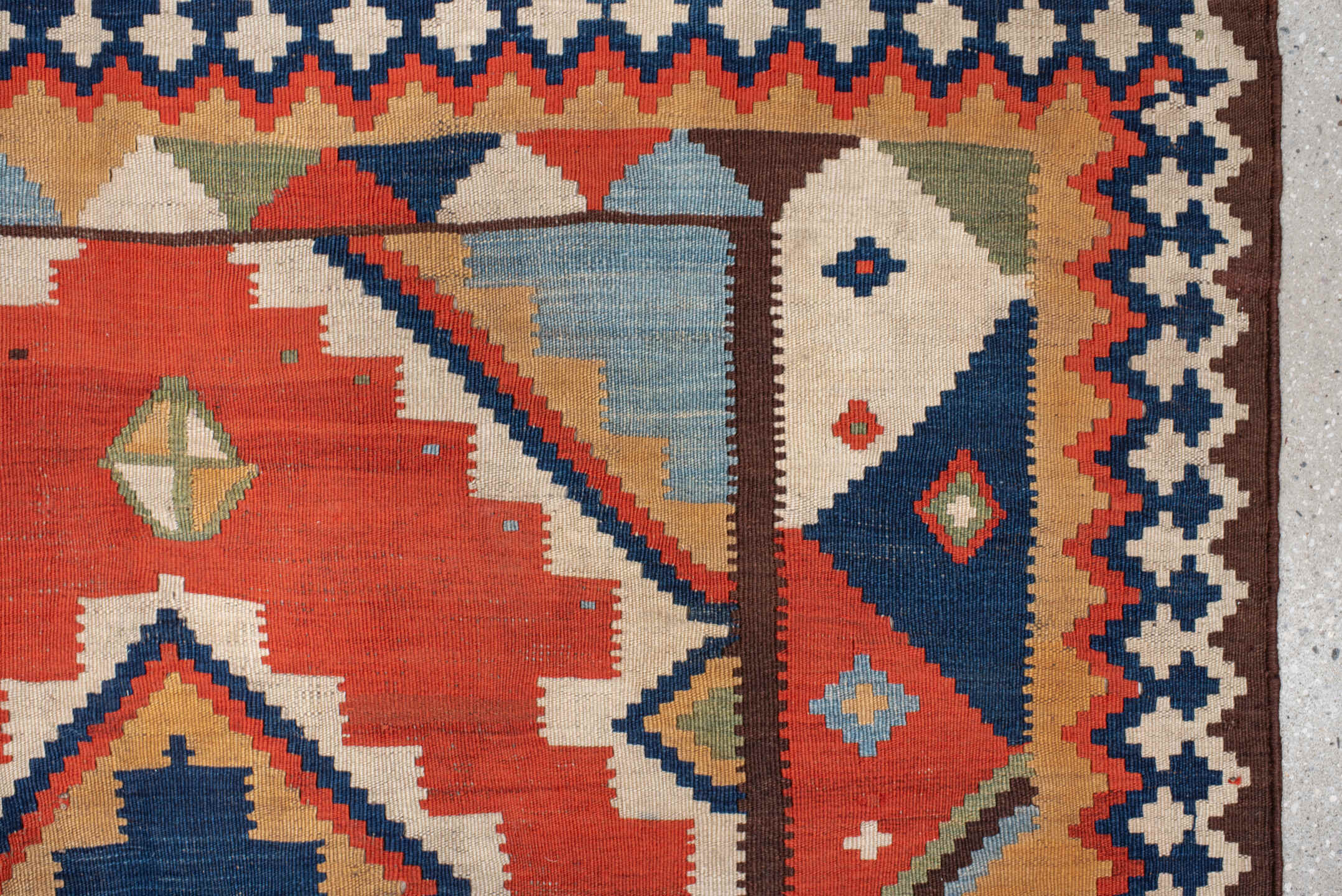 4' x 8' one-of-a-kind handmade vintage Kilim rug. Color palette: rust, ivory, sky_blue, navy, brown, camel, olive, coral