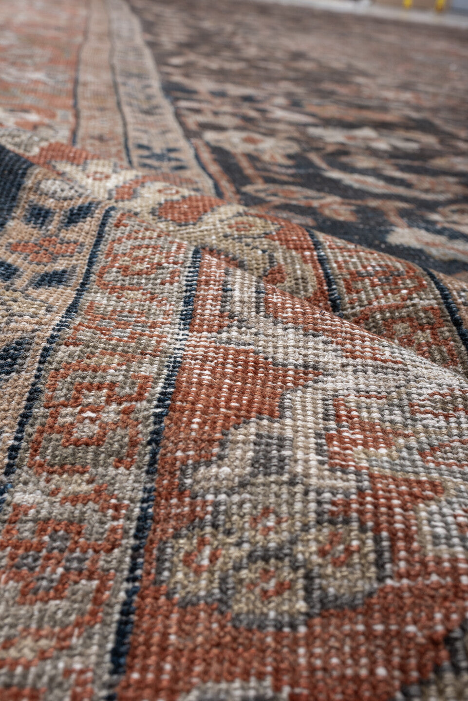 12' x 17' one-of-a-kind handmade antique Mahal oversize rug. Color palette: charcoal, rust, ivory, taupe, slate, camel, sage