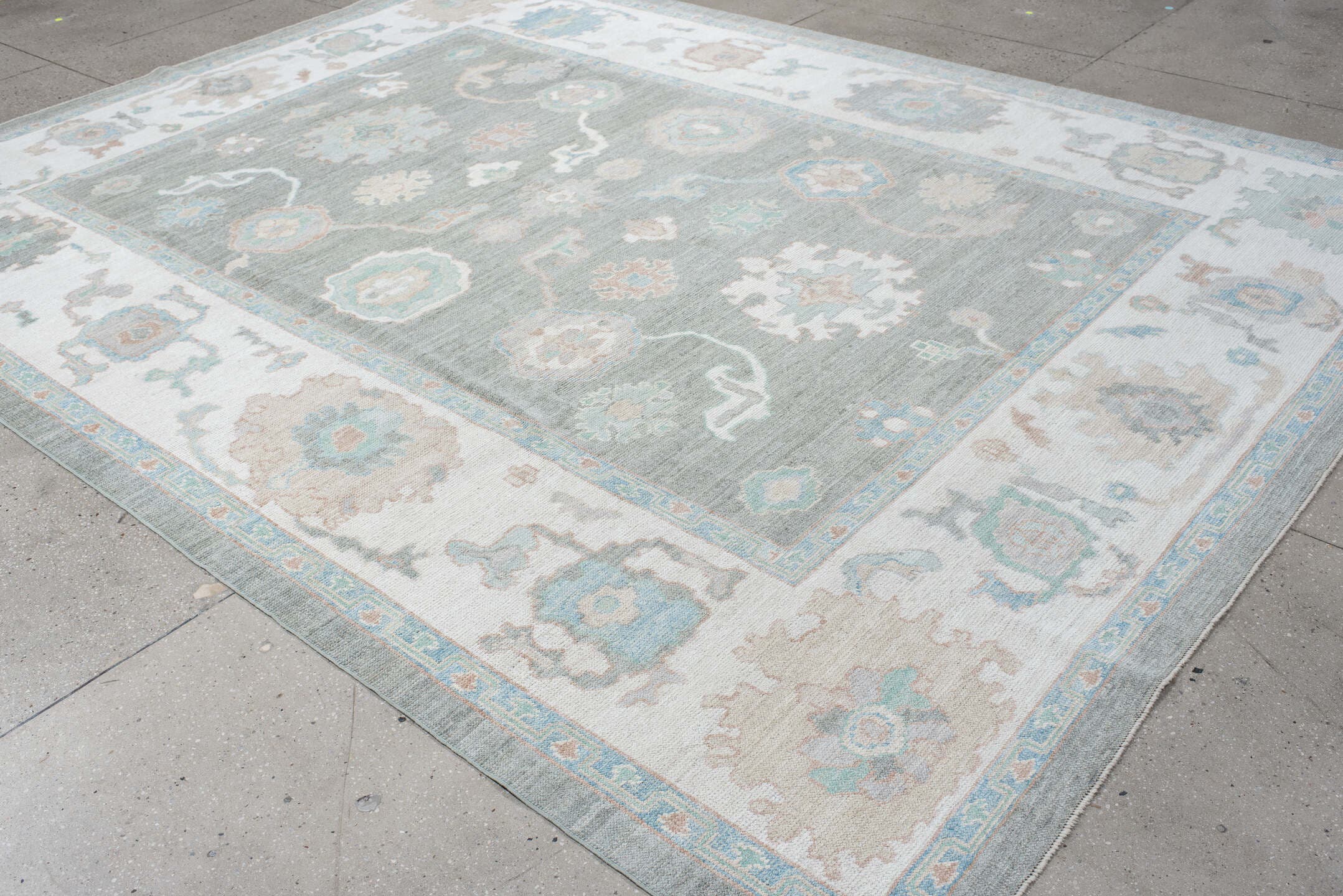 9' x 12' one-of-a-kind handmade vintage Oushak large size rug. Color palette: gray, ivory, pale aqua, taupe, blush, beige
