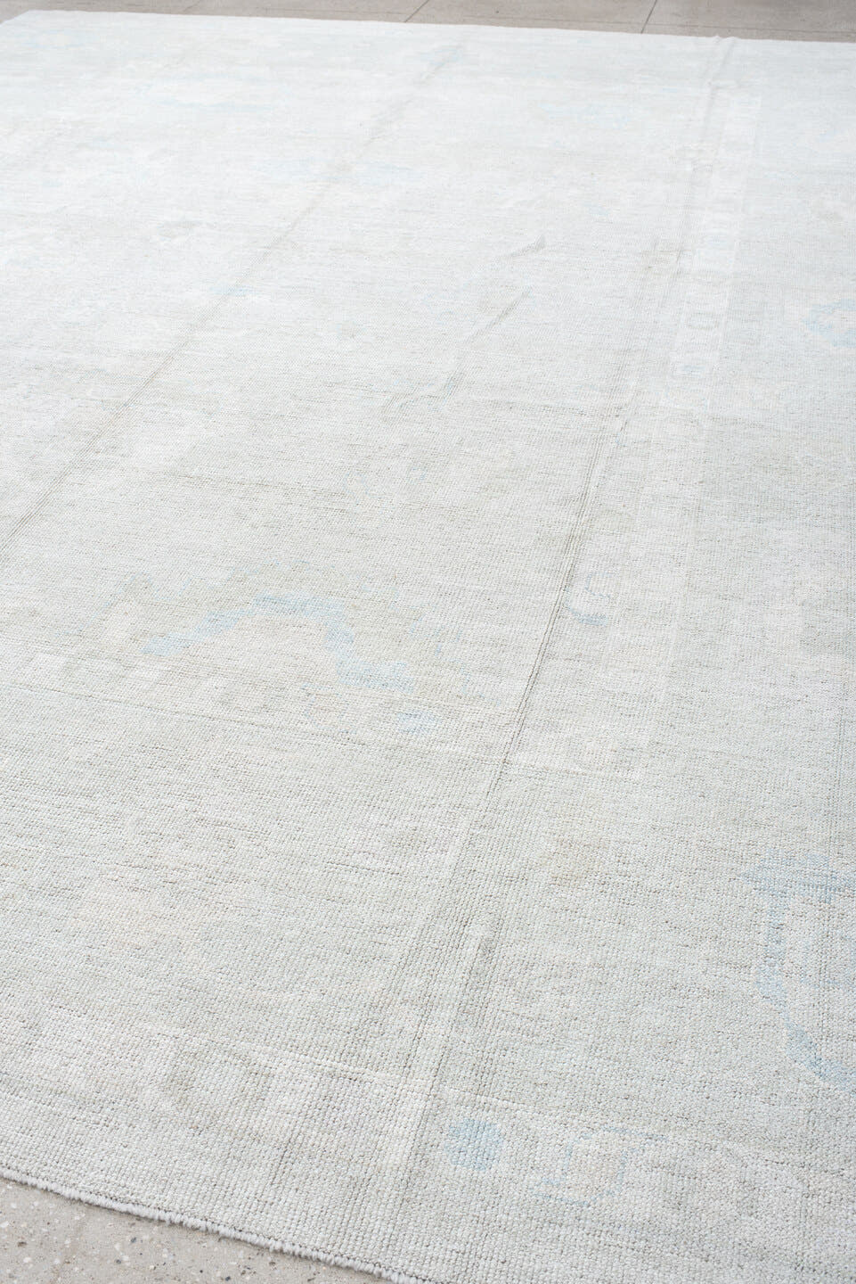 12' x 14' one-of-a-kind handmade vintage Oushak oversize rug. Color palette: ivory, pale blue, light gray, cream, light blue