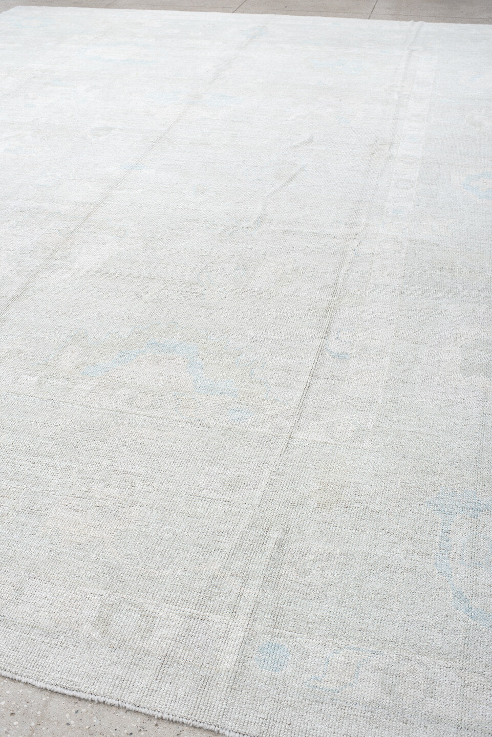 12' x 14' one-of-a-kind handmade vintage Oushak oversize rug. Color palette: ivory, pale blue, light gray, cream, light blue