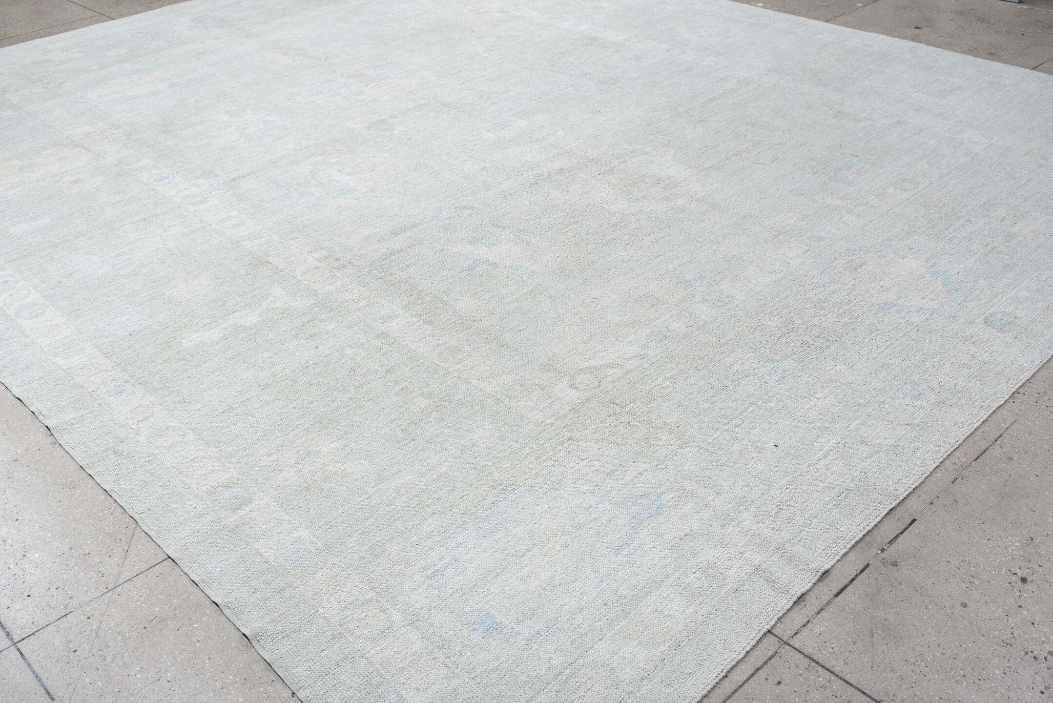 12' x 14' one-of-a-kind handmade vintage Oushak oversize rug. Color palette: ivory, pale blue, light gray, cream, light blue
