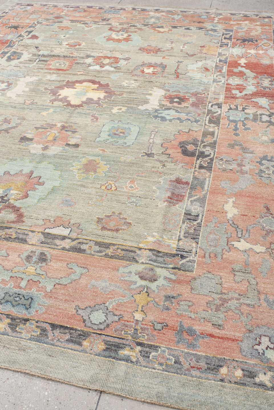 9' x 12' one-of-a-kind handmade vintage Oushak large size rug. Color palette: gray, salmon, aqua, slate, ivory, rust, taupe
