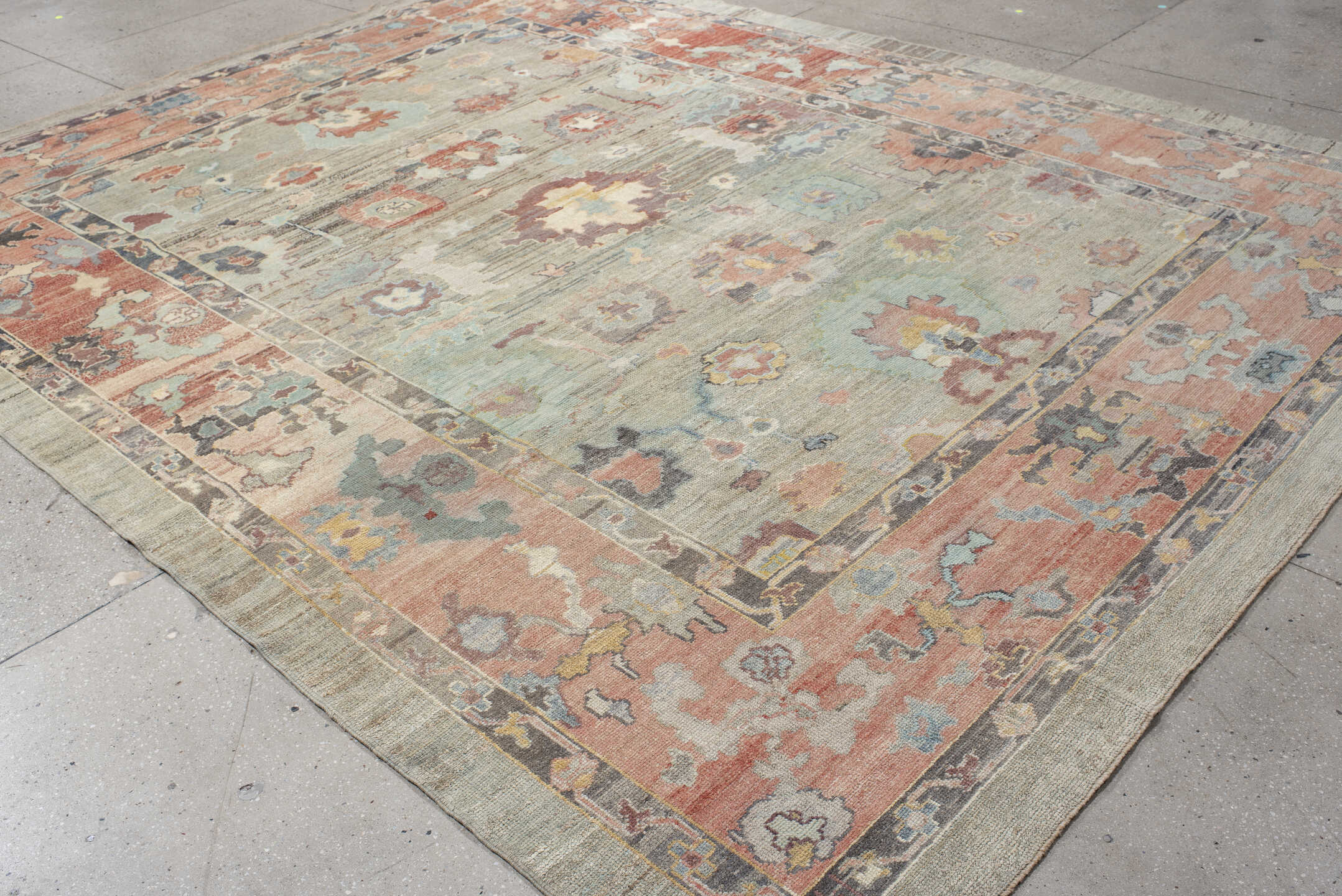 9' x 12' one-of-a-kind handmade vintage Oushak large size rug. Color palette: gray, salmon, aqua, slate, ivory, rust, taupe