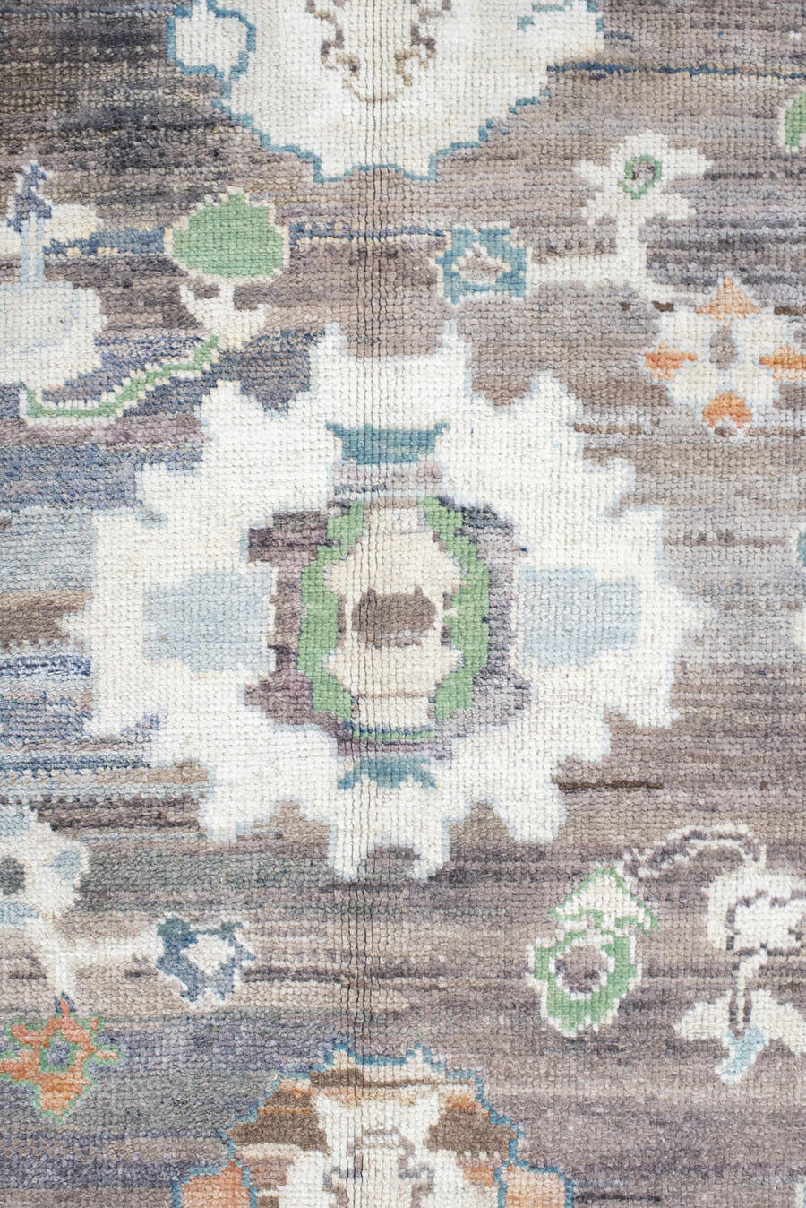 9' x 11' one-of-a-kind handmade vintage Oushak large size rug. Color palette: charcoal, apricot, ivory, sky blue, sage