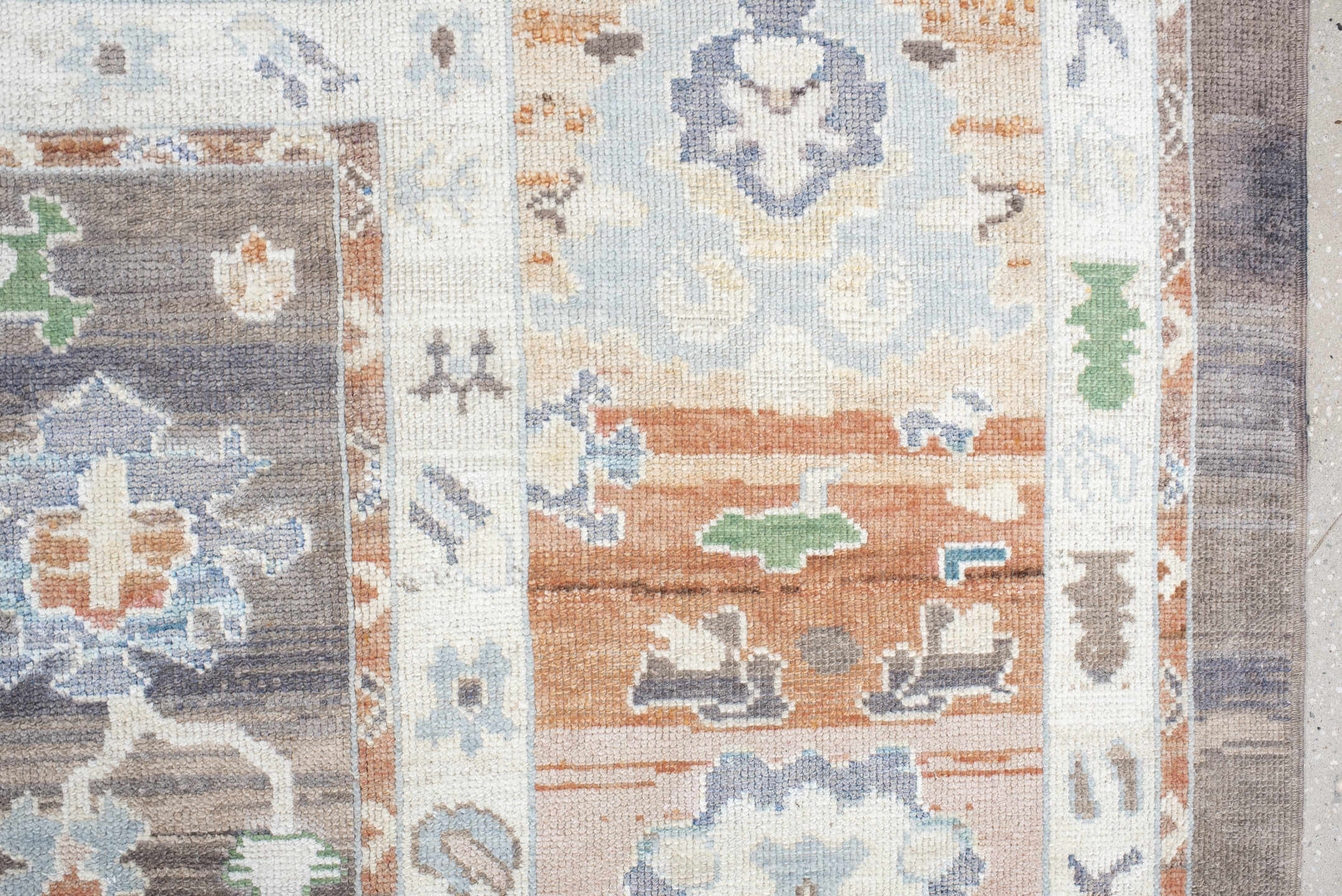 9' x 11' one-of-a-kind handmade vintage Oushak large size rug. Color palette: charcoal, apricot, ivory, sky blue, sage