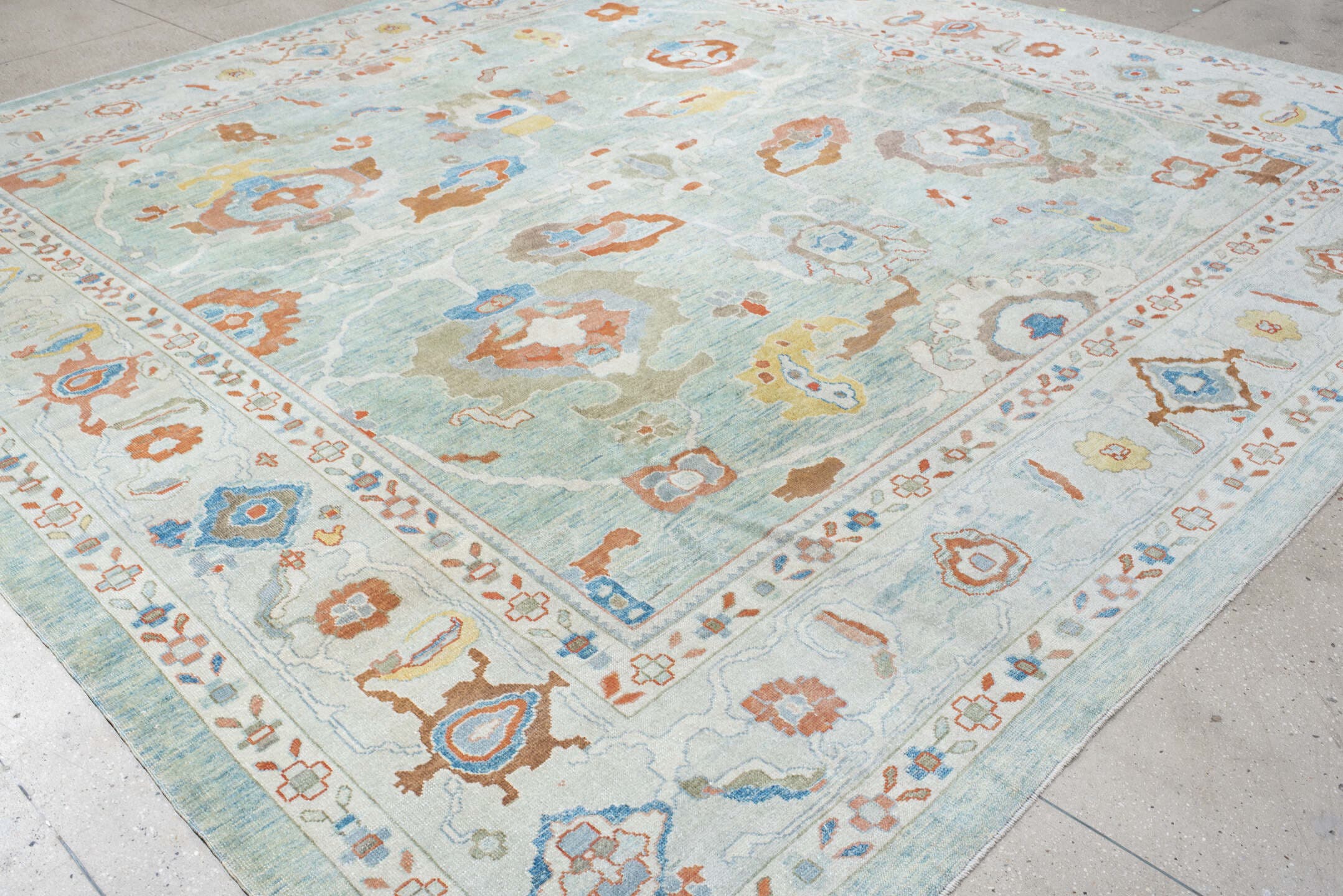 12' x 12' one-of-a-kind handmade vintage Sultanabad oversize rug. Color palette: aqua, ivory, coral, taupe, sky_blue, gold