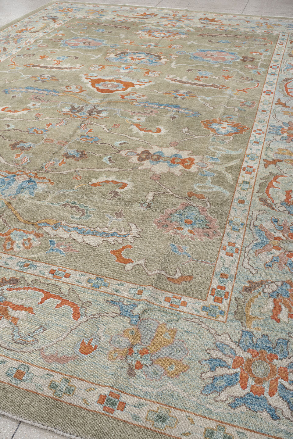 10' x 13' one-of-a-kind handmade vintage Sultanabad large size rug. Color palette: sage, ivory, sky blue, coral, taupe