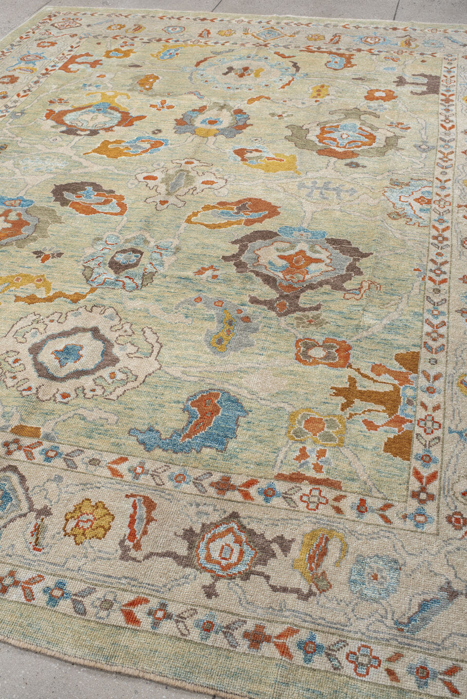 8' x 10' one-of-a-kind handmade vintage Sultanabad large size rug. Color palette: aqua, ivory, rust, sky blue, taupe, gold