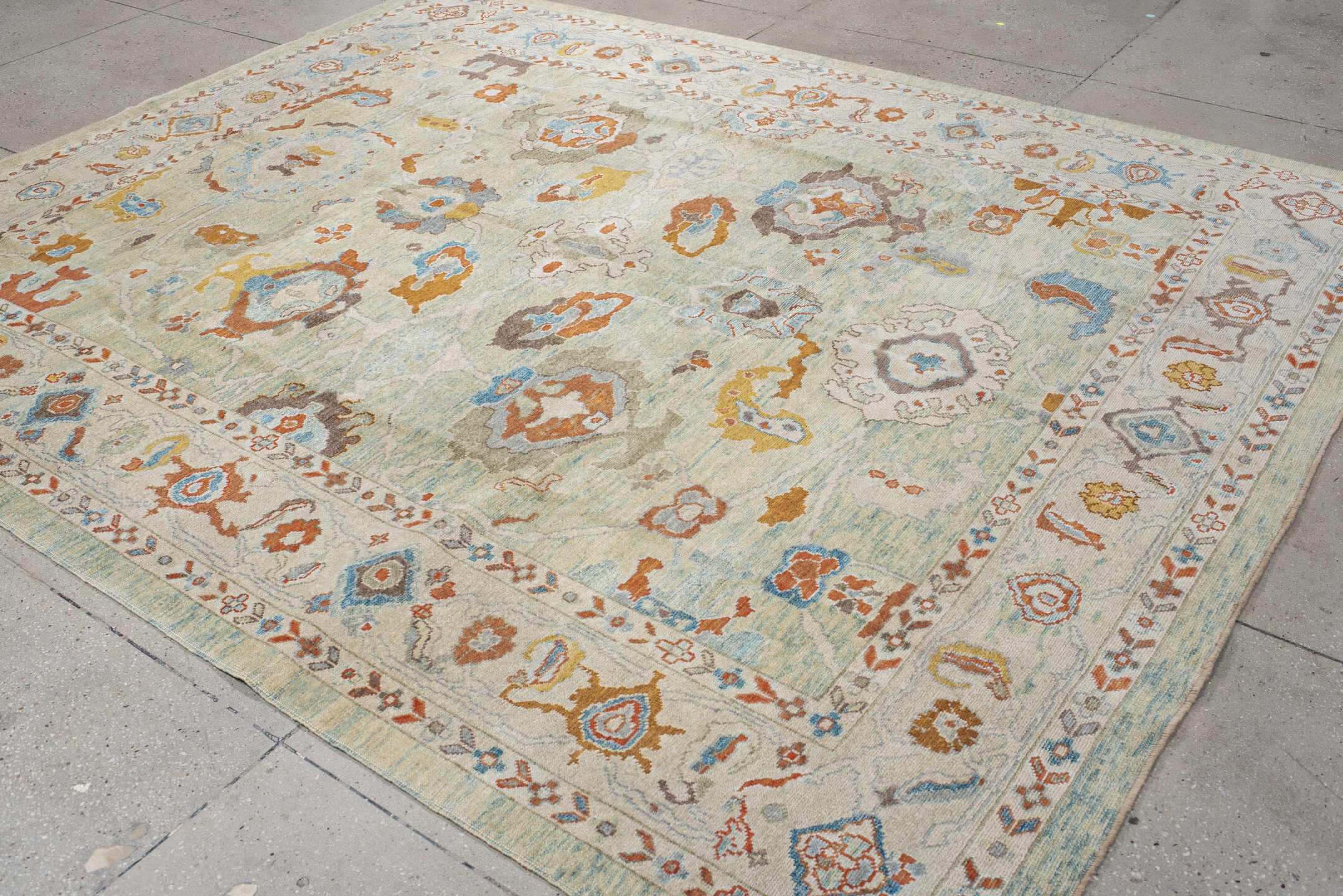 8' x 10' one-of-a-kind handmade vintage Sultanabad large size rug. Color palette: aqua, ivory, rust, sky blue, taupe, gold