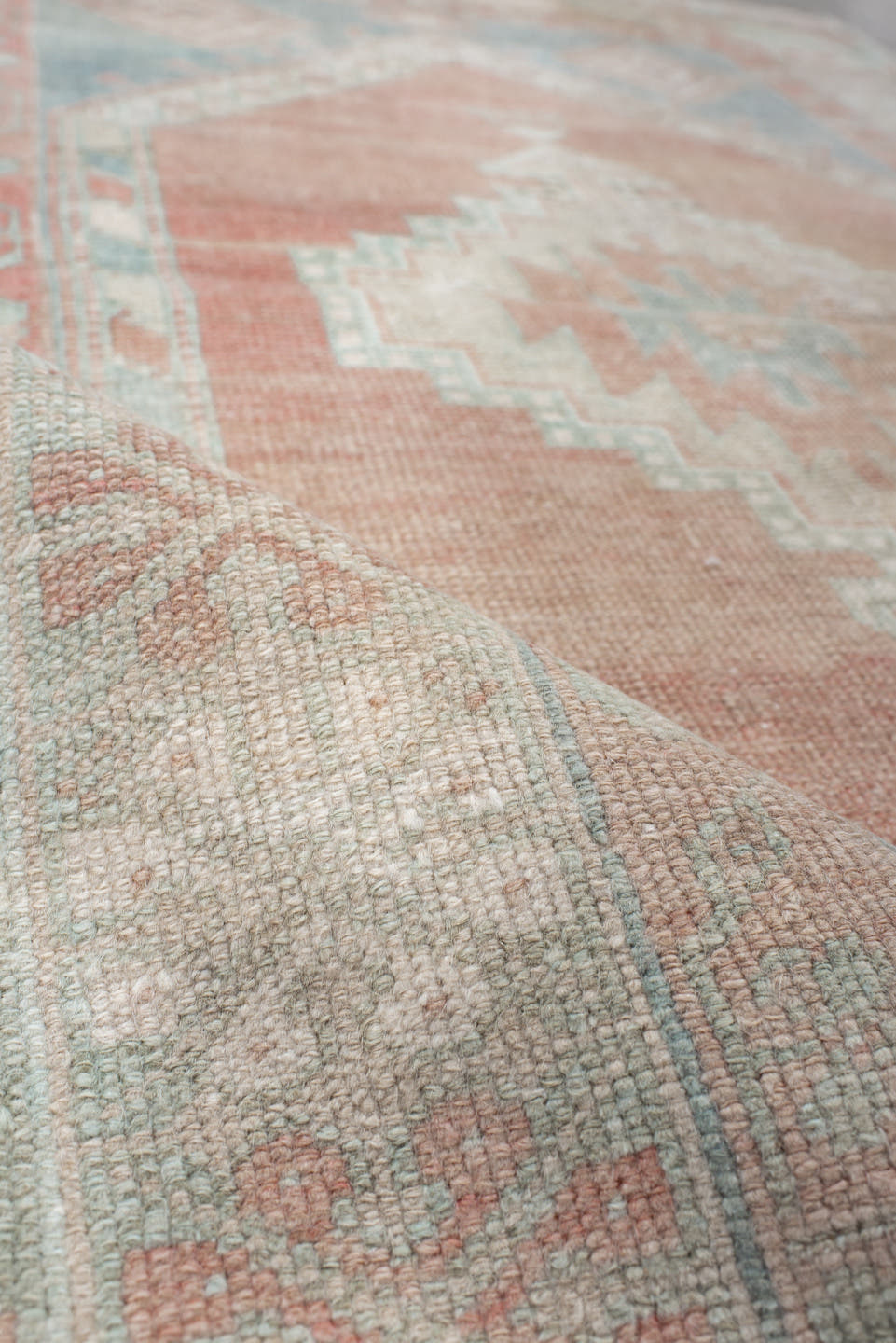 3' x 5' one-of-a-kind handmade vintage Anatolian small size rug. Color palette: ivory, pale blue, blush, coral, taupe, sage