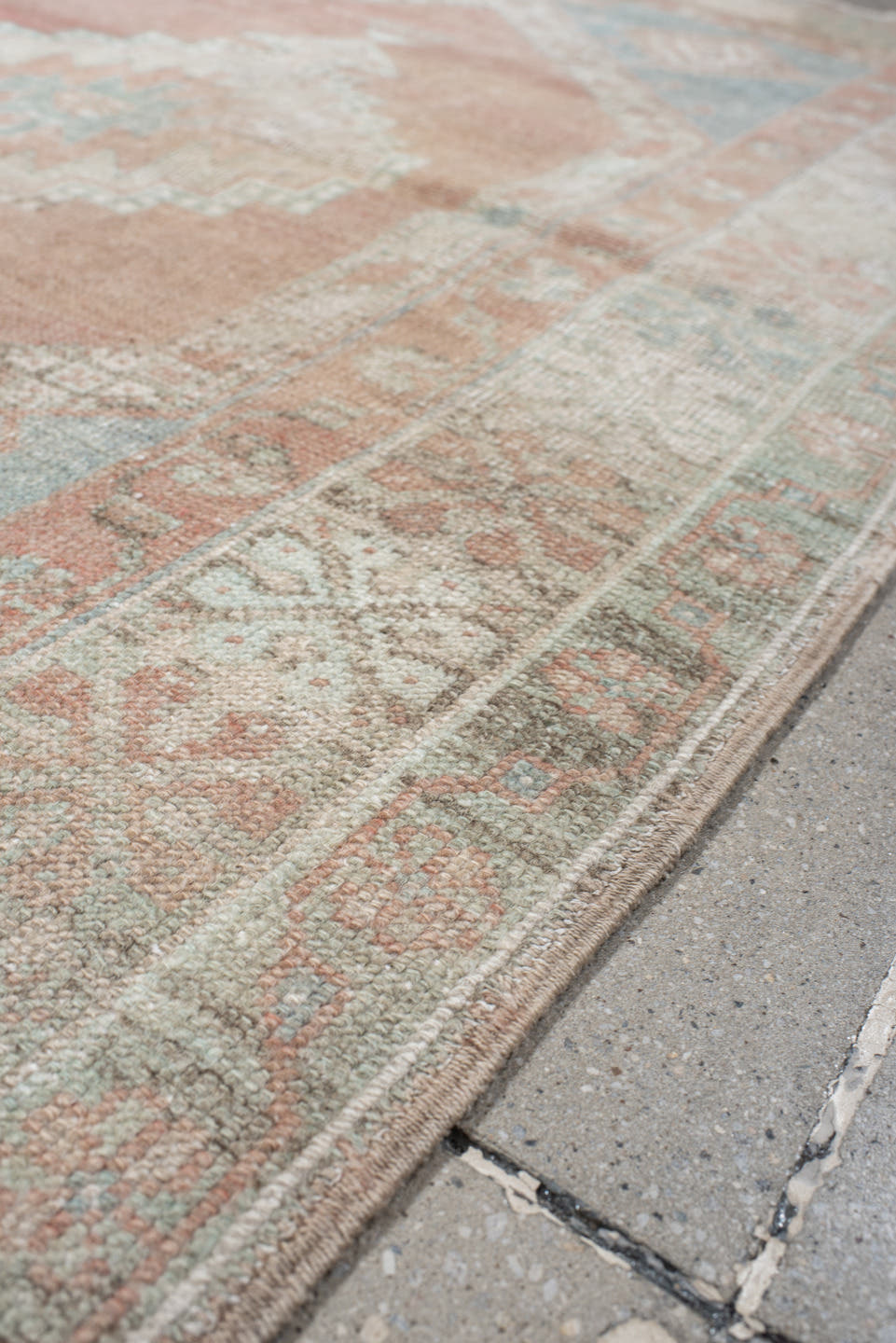 3' x 5' one-of-a-kind handmade vintage Anatolian small size rug. Color palette: ivory, pale blue, blush, coral, taupe, sage