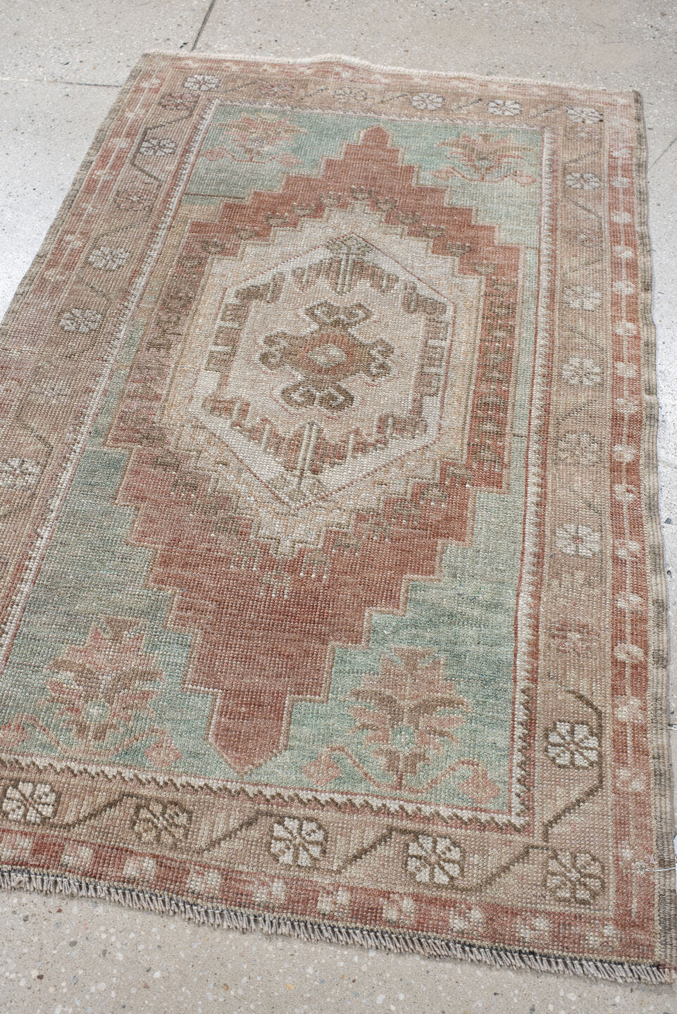 2' x 4' one-of-a-kind handmade vintage Anatolian small size rug. Color palette: ivory, blush, taupe, sage, terra cotta