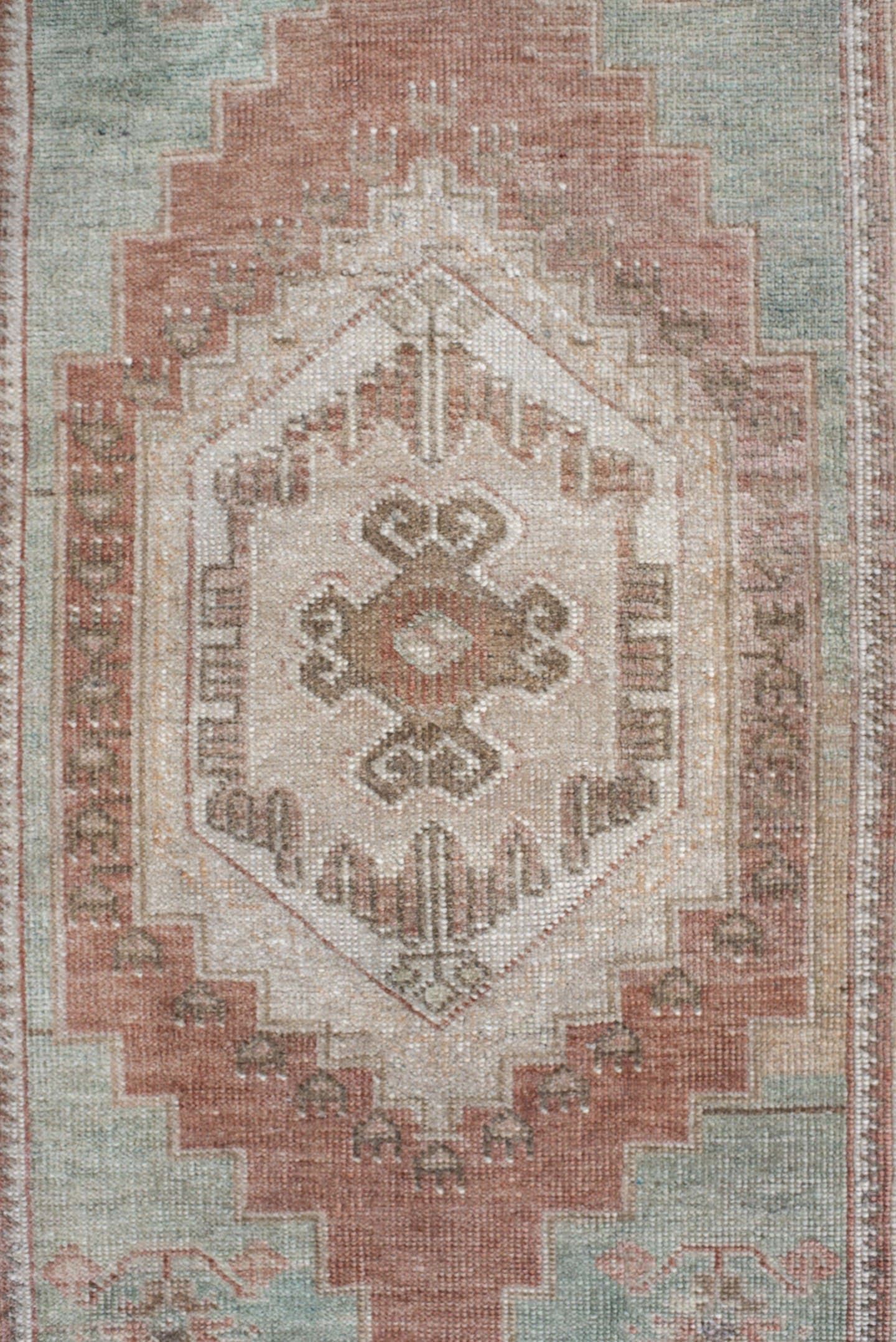 2' x 4' one-of-a-kind handmade vintage Anatolian small size rug. Color palette: ivory, blush, taupe, sage, terra cotta
