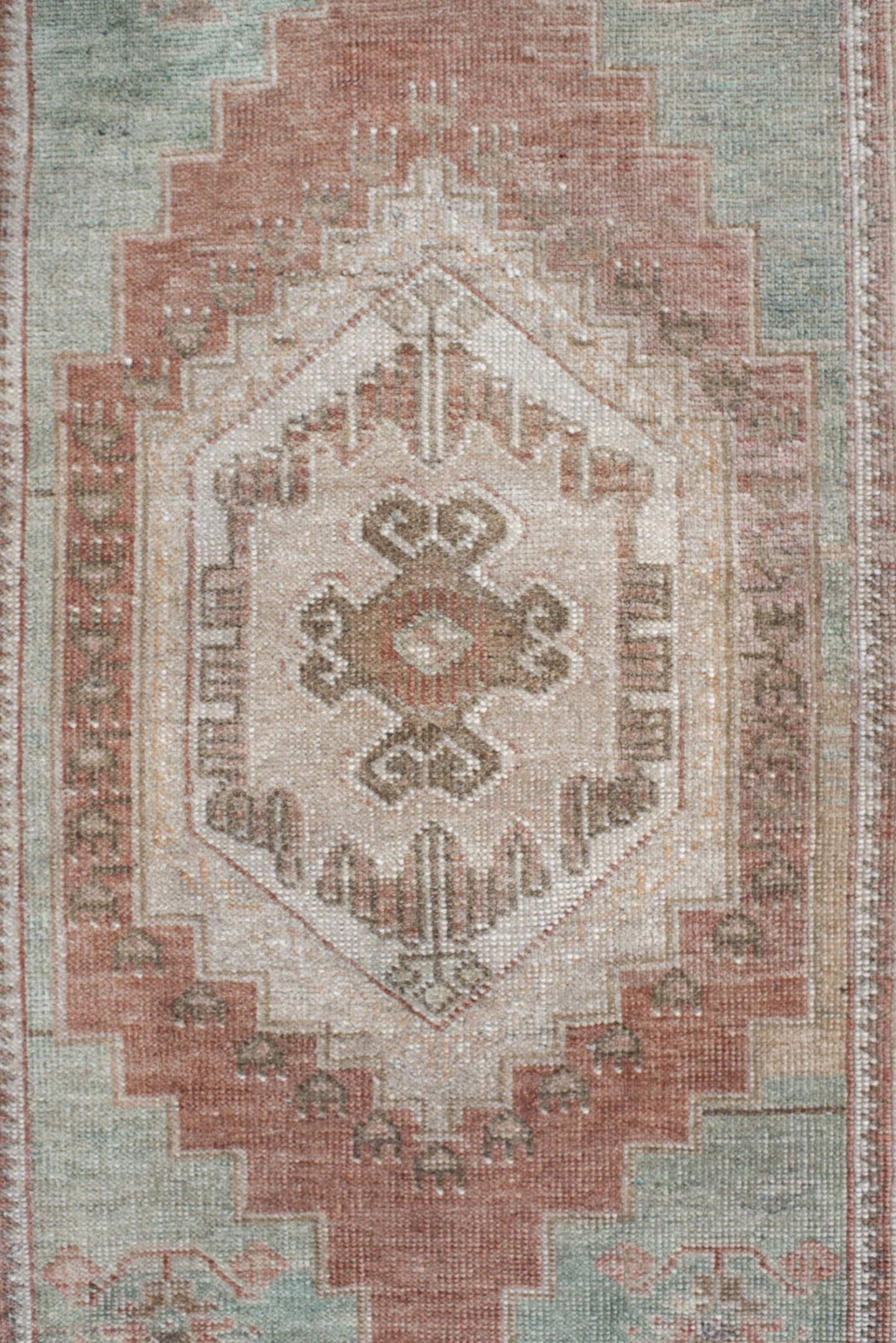 2' x 4' one-of-a-kind handmade vintage Anatolian small size rug. Color palette: ivory, blush, taupe, sage, terra cotta