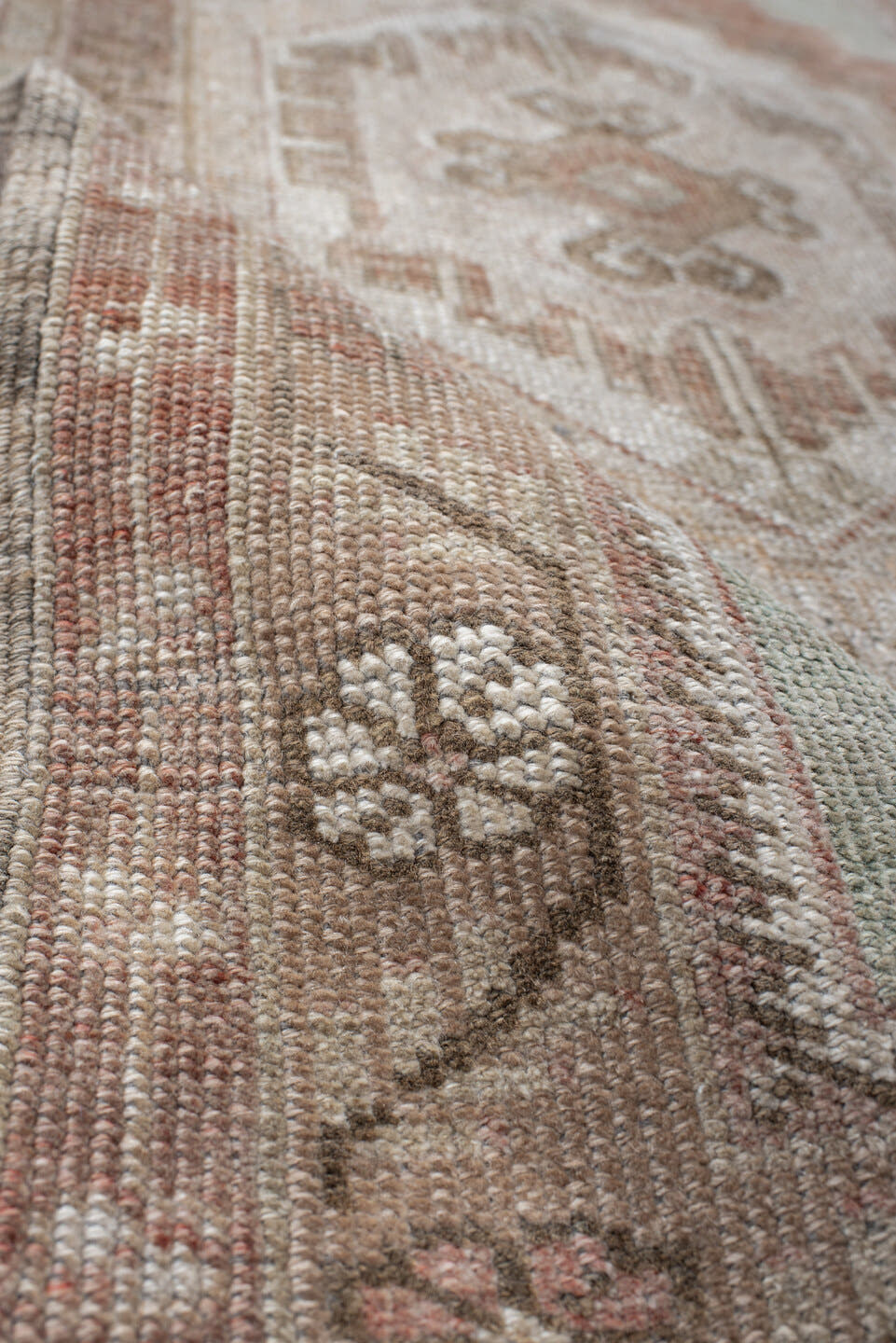 2' x 4' one-of-a-kind handmade vintage Anatolian small size rug. Color palette: ivory, blush, taupe, sage, terra cotta