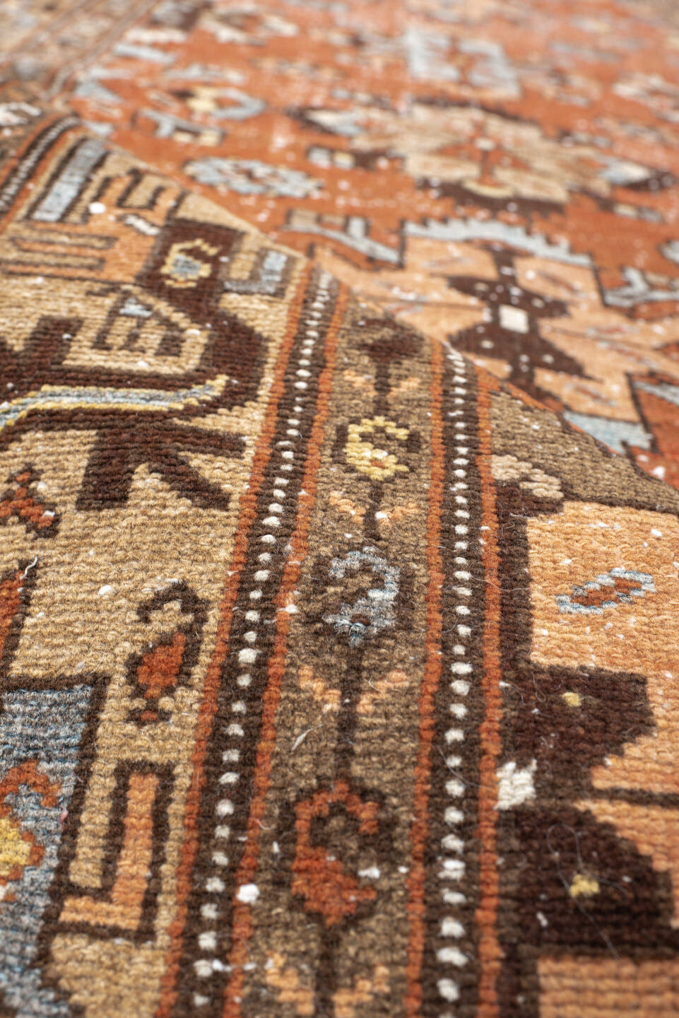 3' x 9' one-of-a-kind handmade vintage Malayer runner rug. Color palette: rust, camel, ivory, brown, slate, taupe, charcoal