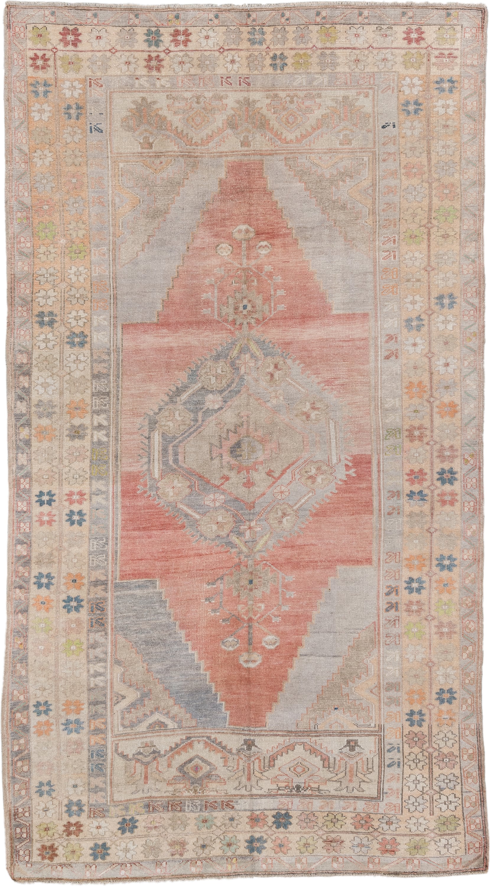 5' x 9' one-of-a-kind handmade antique Anatolian medium size rug. Color palette: ivory, coral, taupe, slate, sage, ochre
