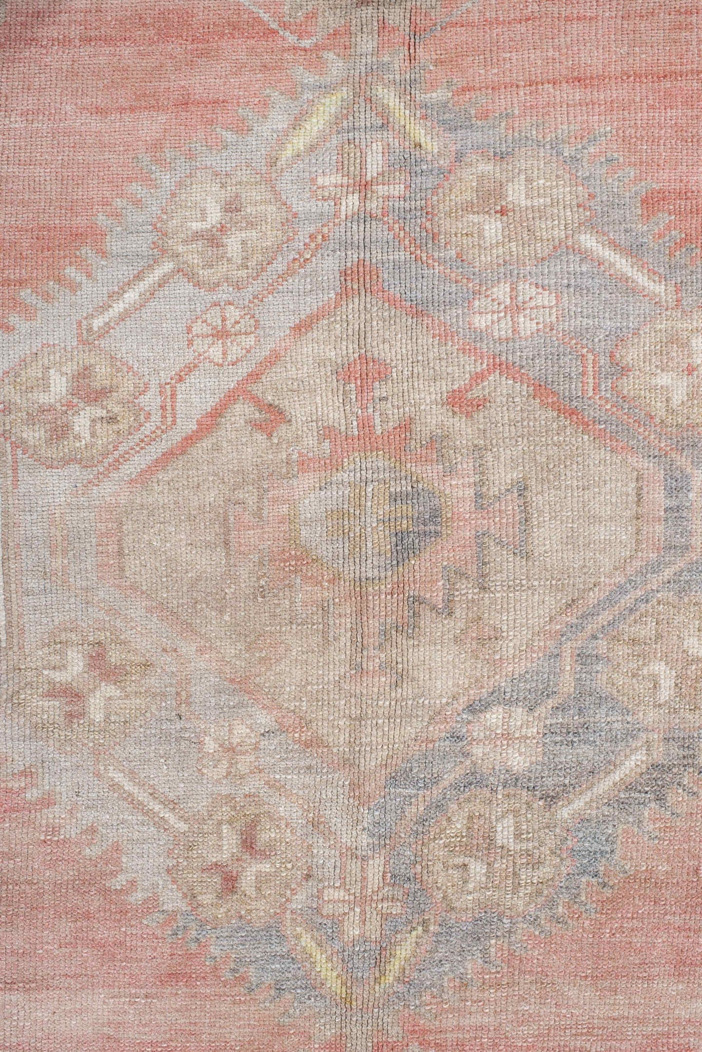 5' x 9' one-of-a-kind handmade antique Anatolian medium size rug. Color palette: ivory, coral, taupe, slate, sage, ochre