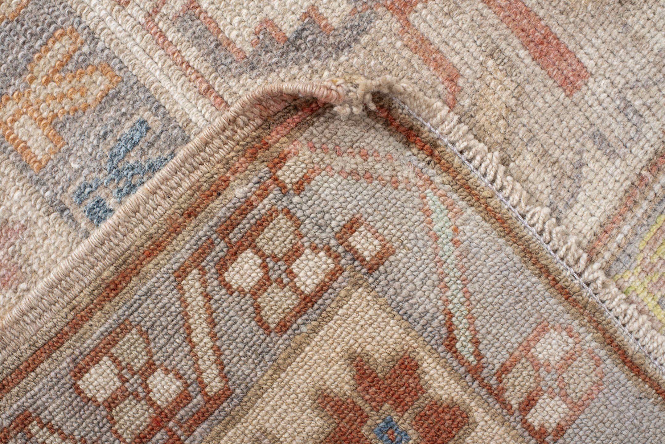 5' x 9' one-of-a-kind handmade antique Anatolian medium size rug. Color palette: ivory, coral, taupe, slate, sage, ochre