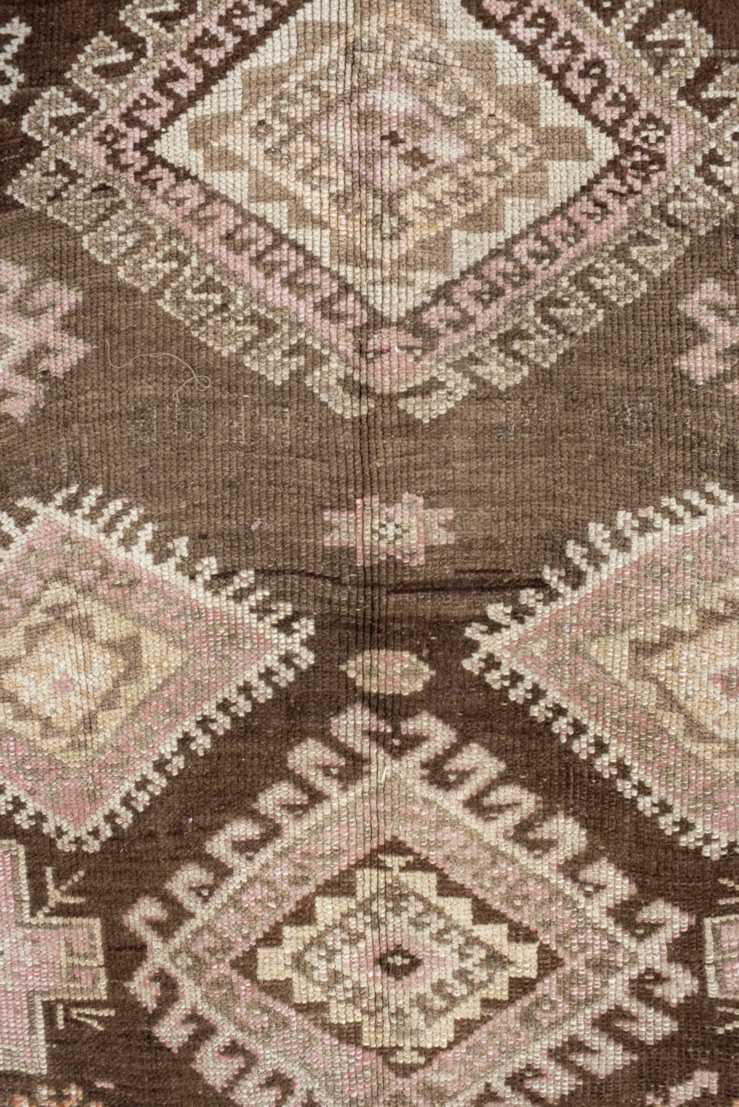 4' x 11' one-of-a-kind handmade vintage Kars runner rug. Color palette: brown, taupe, ivory, blush, beige, camel, charcoal