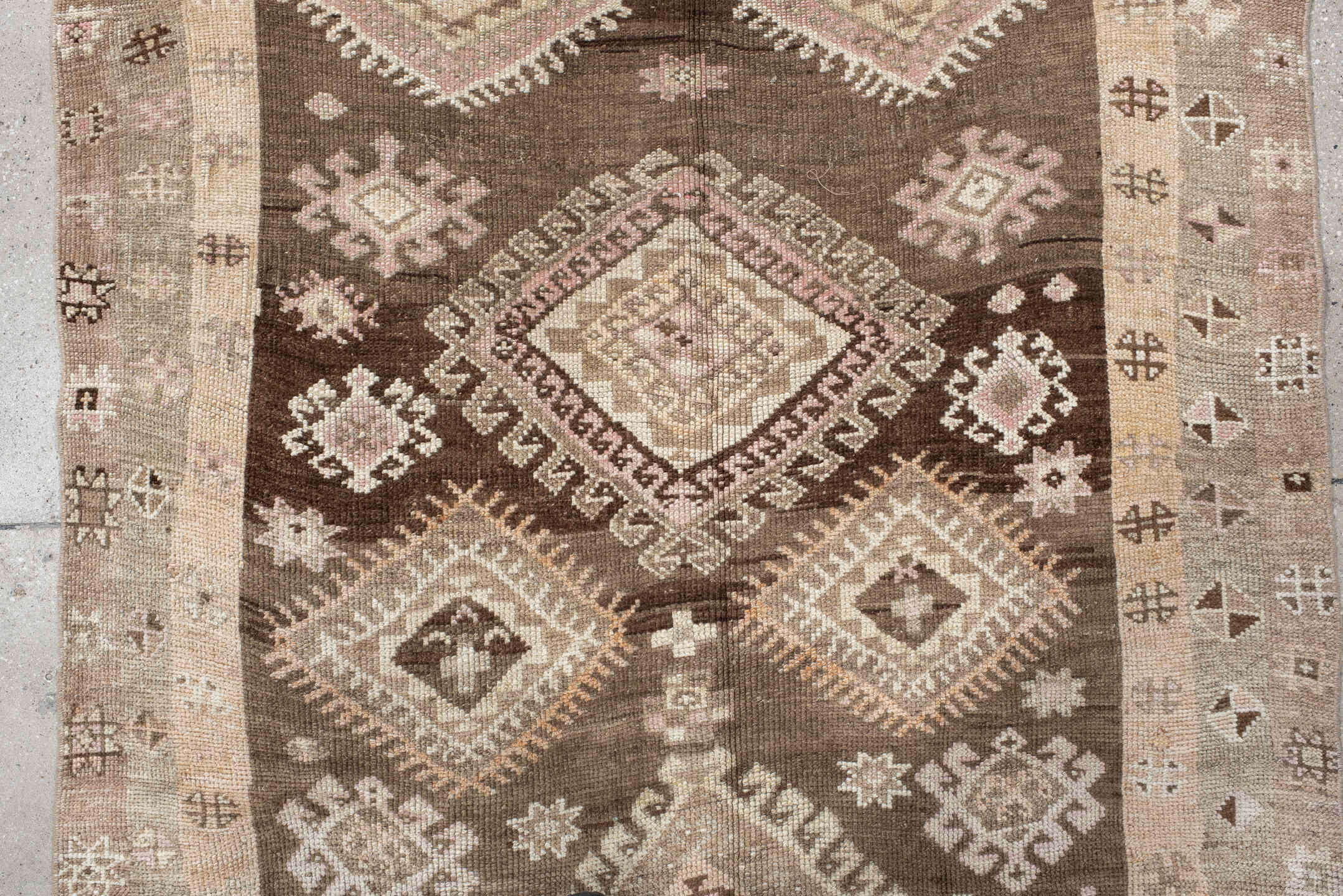 4' x 11' one-of-a-kind handmade vintage Kars runner rug. Color palette: brown, taupe, ivory, blush, beige, camel, charcoal