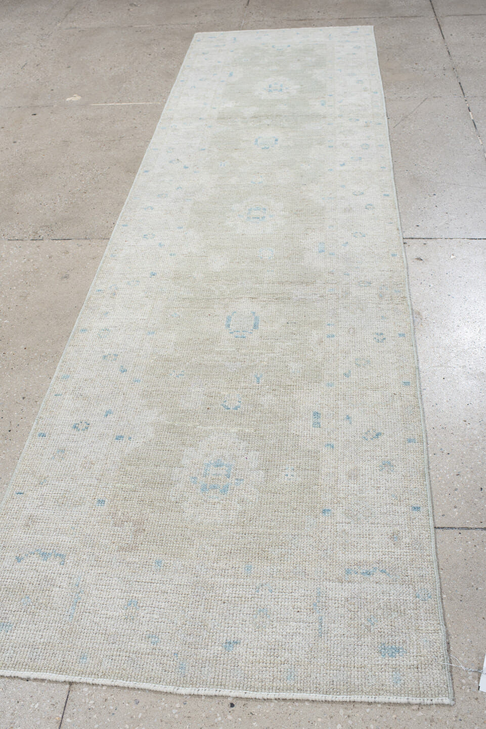 3' x 11' one-of-a-kind handmade antique Oushak runner rug. Color palette: ivory, pale blue, cream, taupe, light blue, beige