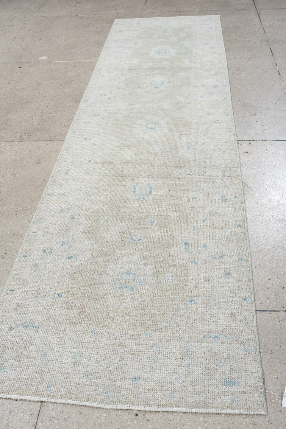 3' x 11' one-of-a-kind handmade antique Oushak runner rug. Color palette: ivory, pale blue, cream, taupe, light blue, beige